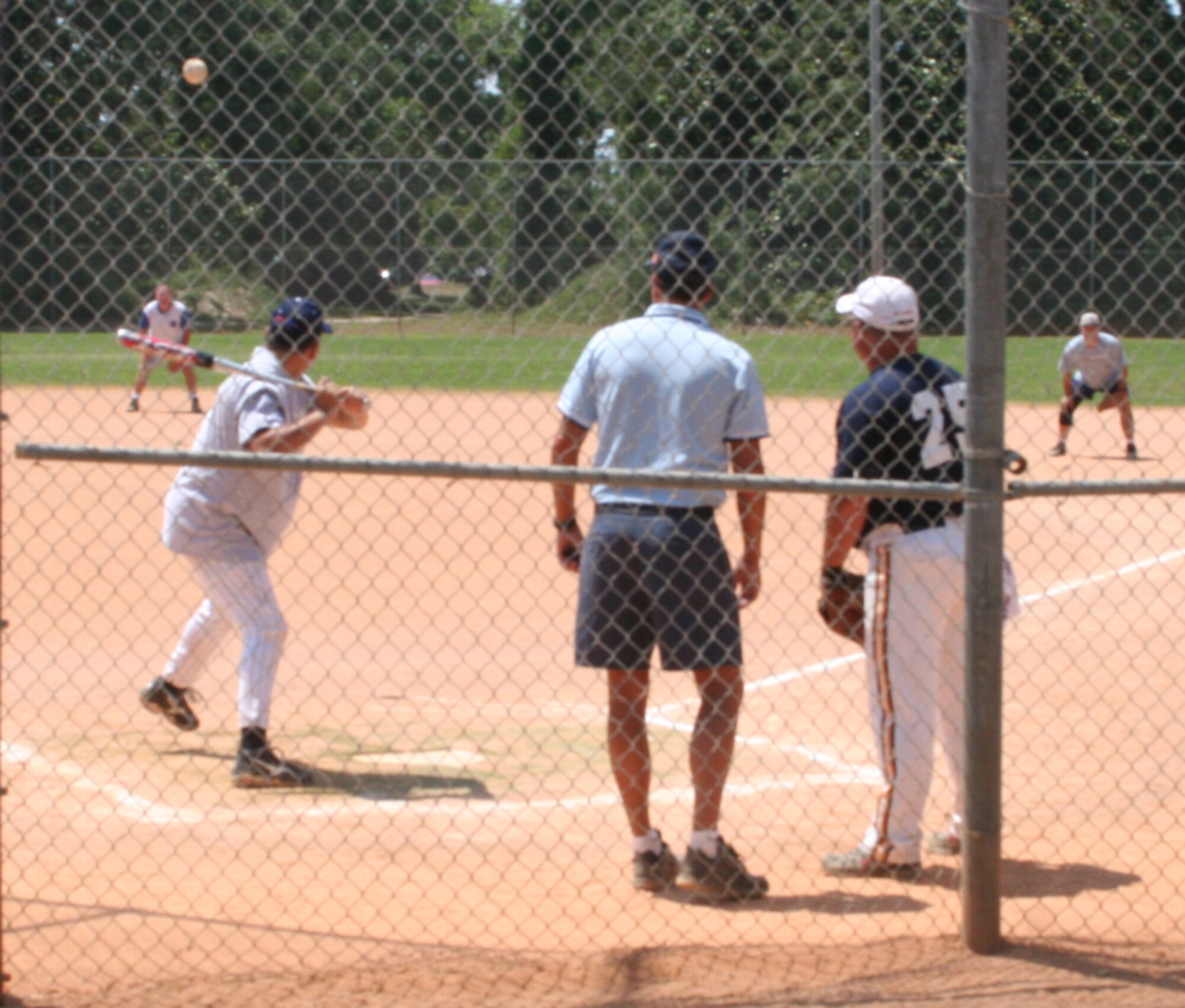 The USAF Special Operations School took on the 1st Special Operations Civil Engineer Squadron in the Over 30 softball double elimination tournament that started Monday. The tournament will run until Tuesday. (U.S. Air Force photo by 2nd Lt. Jesse Brannen)