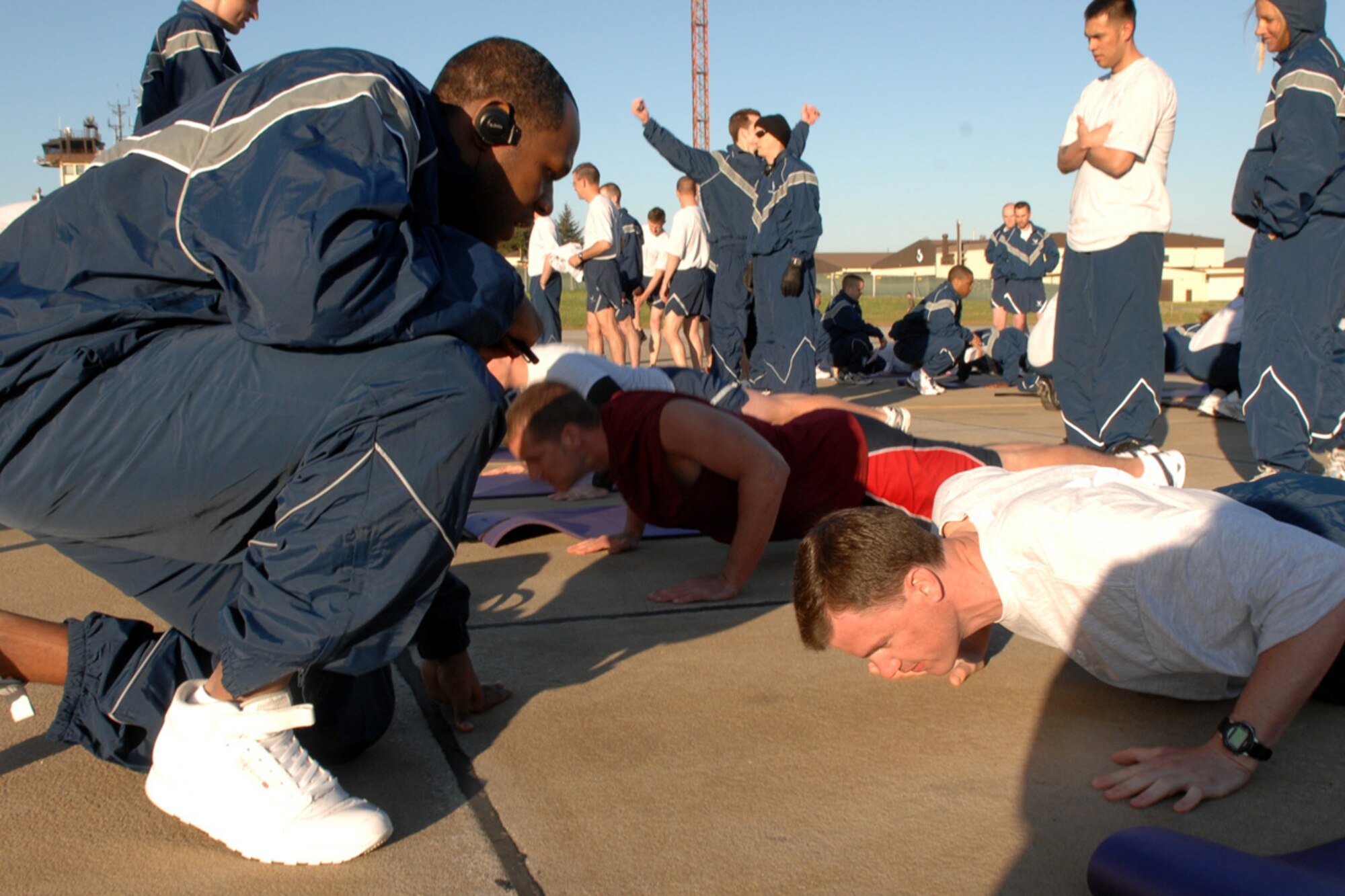 SPANGDAHLEM AIR BASE, GERMANY -- More than 70 Airmen stepped up to accept the 52nd Fighter Wing commander’s physical fitness challenge in the hope of receiving a three day weekend during a wing fun run on the Spangdahlem Air Base flight line May 1. (US Air Force photo/Senior Airman Josie Kemp)
