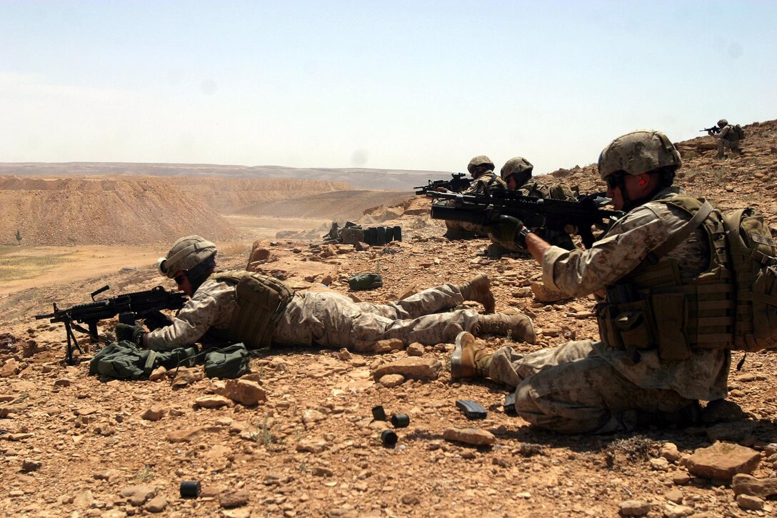 Marines from Reconnaissance Platoon, Battalion Landing Team 2/2, 26th Marine Expeditionary Unit, fire on targets during an ambush at a range in the Middle East, May 25, 2007.  The Recon Plt. was conducting live-fire ambush training alongside regional forces.  (Official USMC photo by Cpl. Jeremy Ross) (Released)