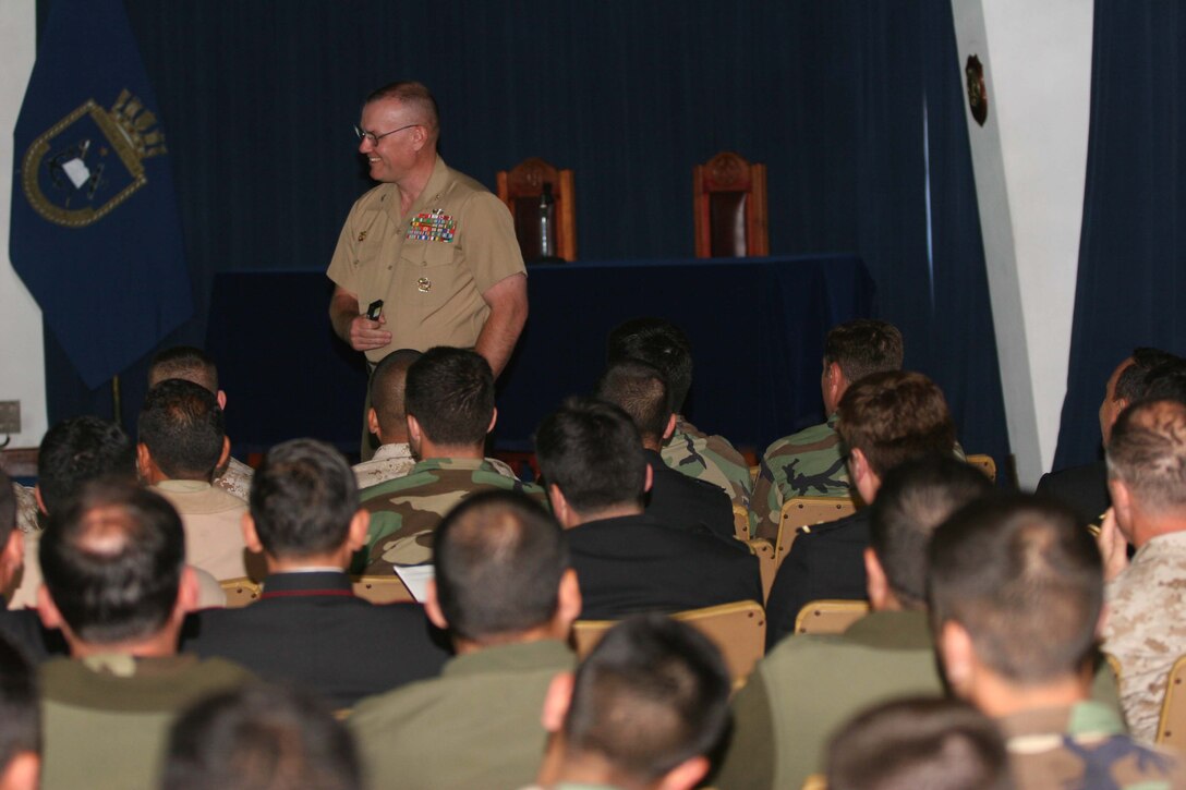 SALINAS, Chile - Col. Brent Dunahoe, commanding officer of 24th Marine Regiment, gives a presentation on the actions of his 3rd Battalion, 2nd Marine Regiment, in the initial phase of Operation Iraqi Freedom, during a Professional Military Education exchange here. The presentation was one of a number of ongoing exchanges between Special Purpose Marine Air Ground Task Force 24 and Chile's Infanteria de Marina in support of Partnership of the Americas 2007, an exercise to increase regional security and cooperation in the Western Hemisphere.