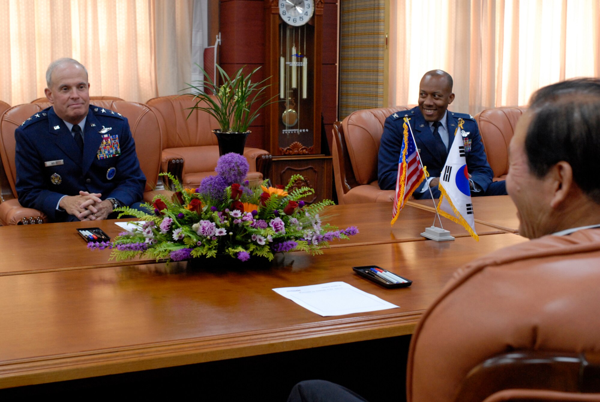 GUNSAN CITY, Republic of Korea May 25, 2007 -- Seventh Air Force Commander Lt. Gen. Stephen Wood (left) and Colonel Charles "Wolf" Brown, the new 8th Fighter Wing commander, meet with Gunsan City Mayor Dong Shin Moon here May 25. The three officials spoke about the relationship between the City of Gunsan and Kunsan Air Force Base during their visit. (U.S. Air Force photo by Senior Airman Barry Loo)