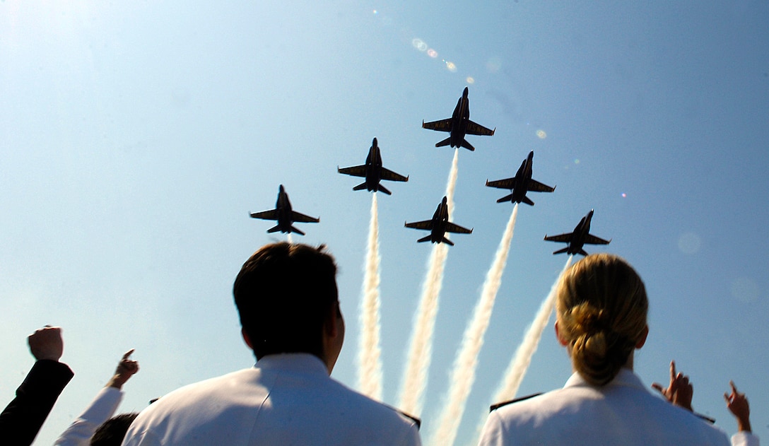 The U.S. Navy Blue Angels fly over during the U.S. Naval Academy