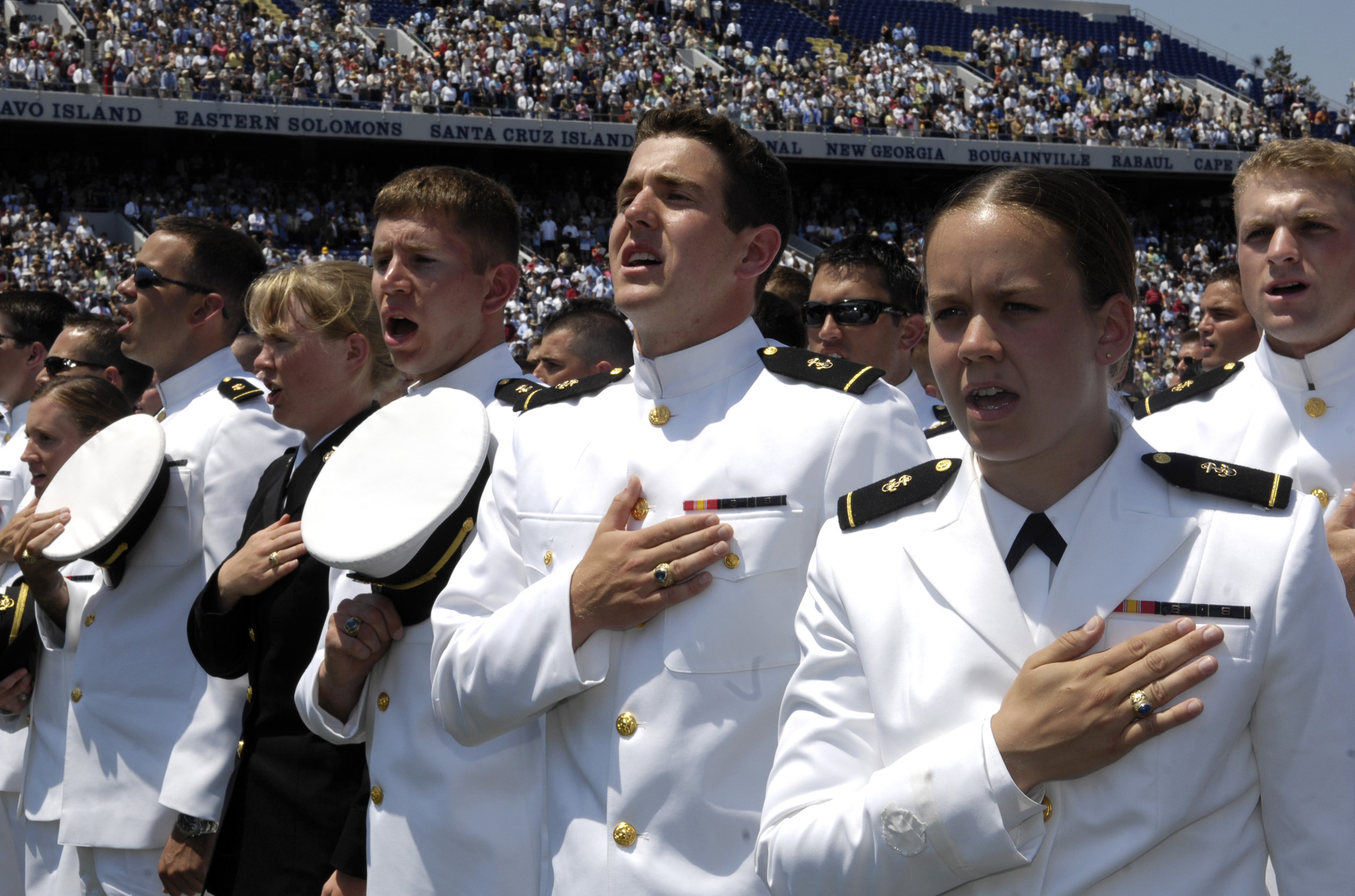 Graduates Of The U S Naval Academy Sing The Navy Blue And Gold Song During Their Graduation Navy blue and gold is the alma mater of the united states naval academy. graduates of the u s naval academy sing the navy blue and gold song during their graduation