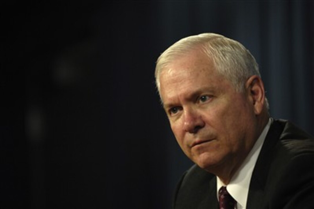 Secretary of Defense Robert M. Gates listens to a reporter's question during a media roundtable with Chairman of the Joint Chiefs of Staff Gen. Peter Pace, U.S. Marine Corps, in the Pentagon on May 24, 2007.  