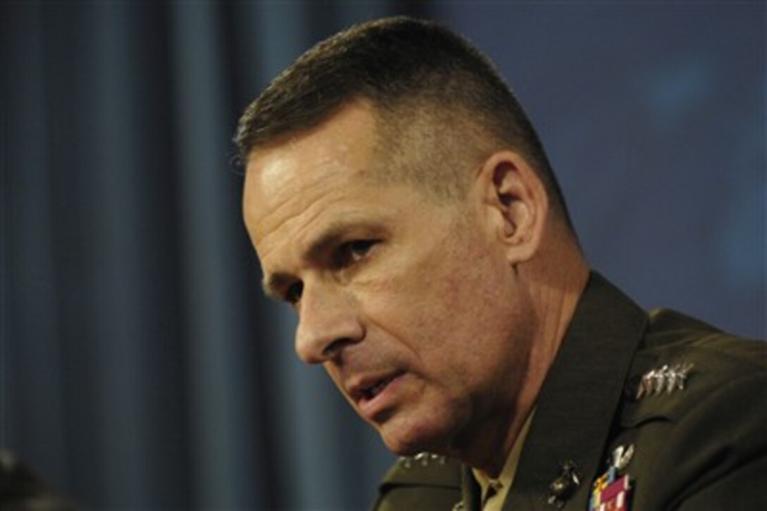 Chairman of the Joint Chiefs of Staff Gen. Peter Pace, U.S. Marine Corps, responds to a reporter's question during a media roundtable with Secretary of Defense Robert M. Gates in the Pentagon on May 24, 2007.  