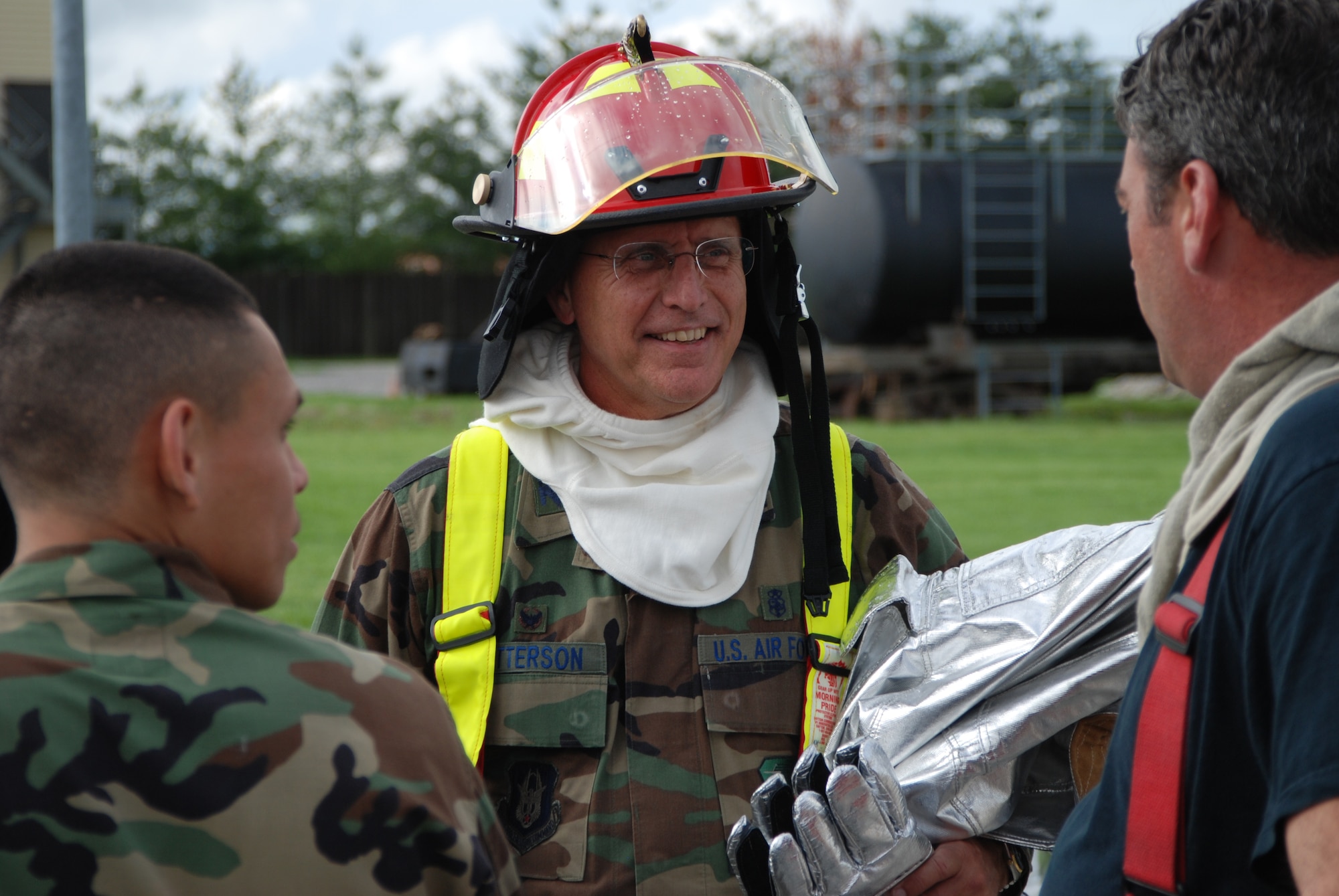 Col. James Patterson shares words of encouragement with 932nd firefighters.  932nd Airlift Wing firefighting Reservists showed their commander how to put out fires Illinois!  Photo/Capt. Stan Paregien