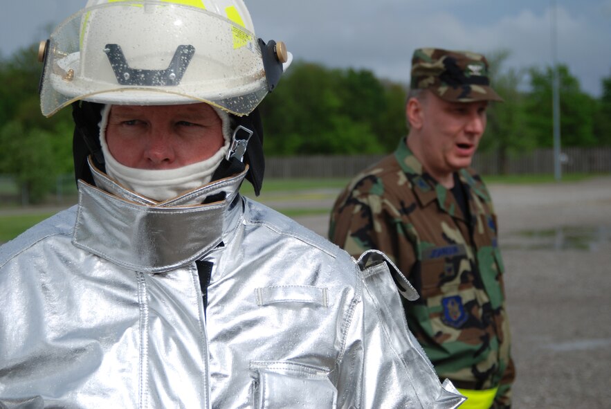 932nd firefighting at its best in Illinoi. 932nd Airlift Wing Command Chief Master Sgt. Merle Lyman and other firefighters wait for the word to move at Scott Air Force Base.  The Reserve wing trained during a four day exercise.  Photo/Capt. Stan Paregien