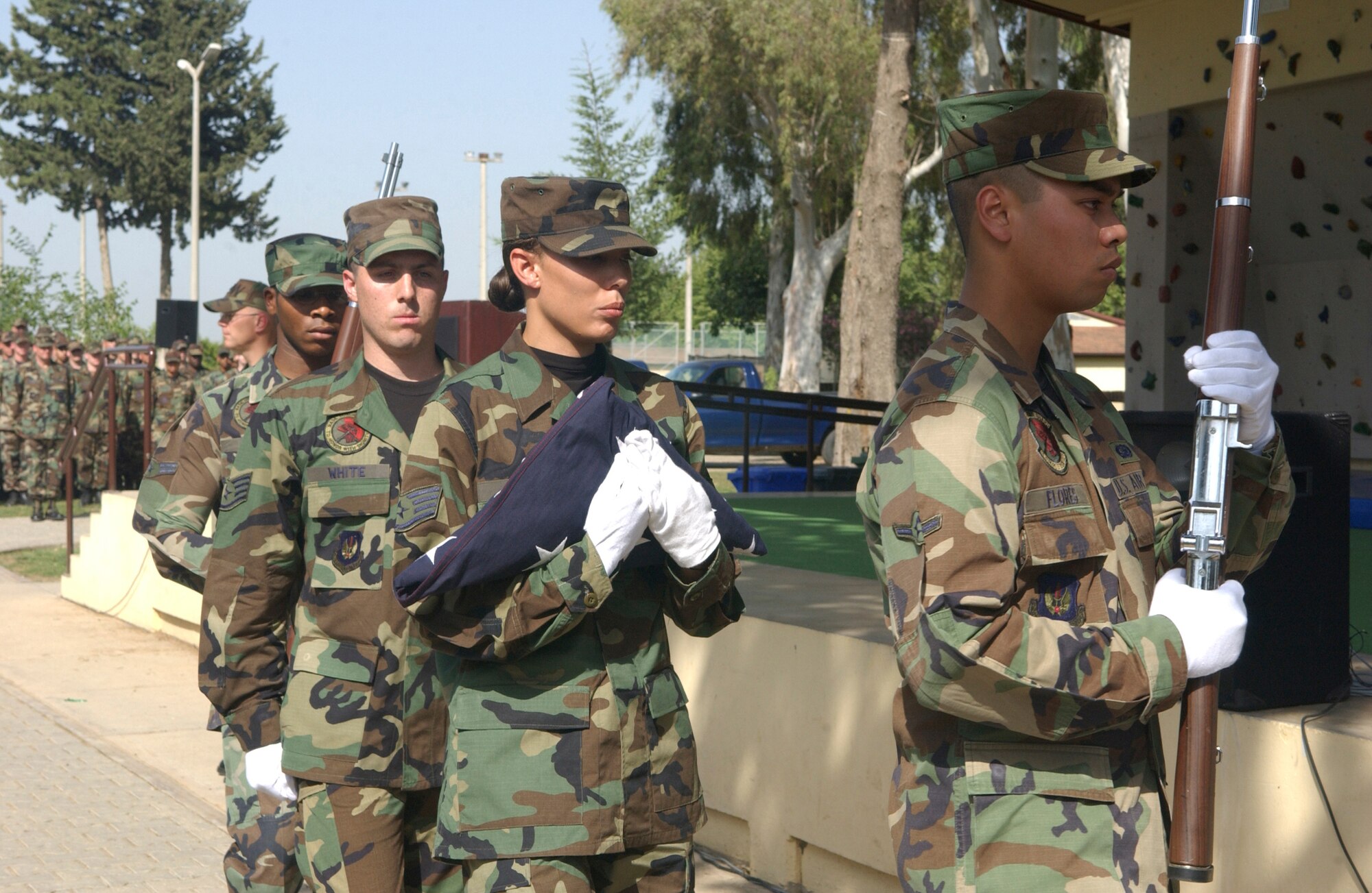 Incirlk Air Base Honor Guard members retire the colors following a Memorial Day ceremony at the base May 25. The American flag was flown aboard a C-17 Globemaster III in support of Operation Iraqi Freedom. (Air Force courtesy photo)    