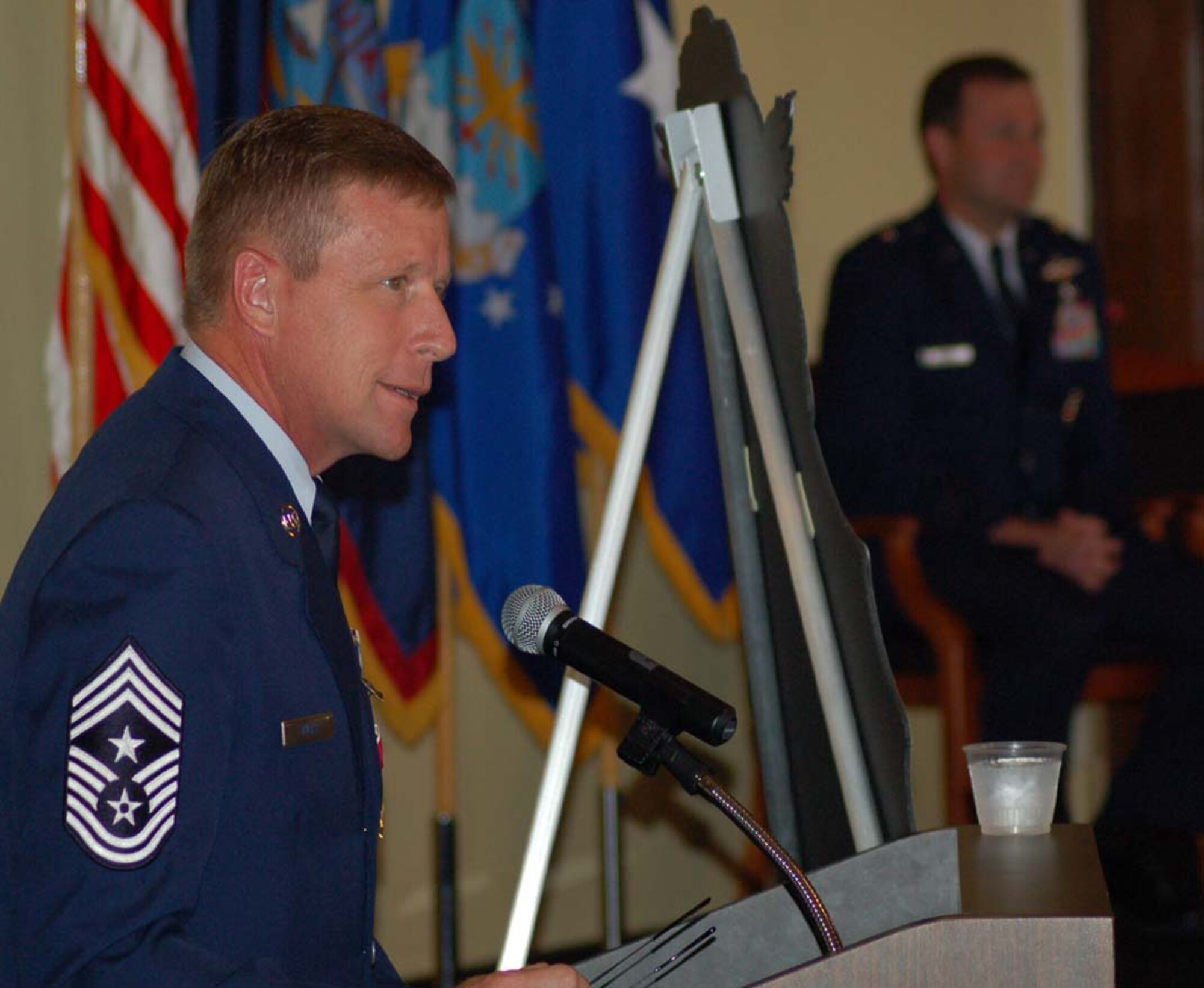 Chief Master Sgt. Robert Wicks, 36th Wing command chief master sergeant, addresses the Airmen and Sailors present for his retirement ceremony Wednesday at the Oceanview Community Center.  (Photo by Tech. Sgt. Brian Bahret/The Pacific Edge)