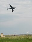 A C-17 Globemaster performed a fly over at Malmstrom Air Force Base's open house and air show May 20. (U.S. Air Force photo by John Turner)