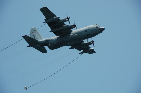 A King makes a royal entrance marking the end of the 920th Rescue Wing's combat search and rescue demonstration at a Florida air show.  The King is the Wing's long range extended refueling HC-130P/N.  The 920th Rescue Wing performed a combat search and rescue demonstration at the 13th annual McDonalds Air & Sea Show held over the beaches of Ft. Lauderdale May 5-6. The King demonstrated its ability to tandem refuel HH-60G Pave Hawk helicopters to extend their ability to perform search and rescue operations.  (U.S. Air Force photo/Capt. Cathleen Snow)