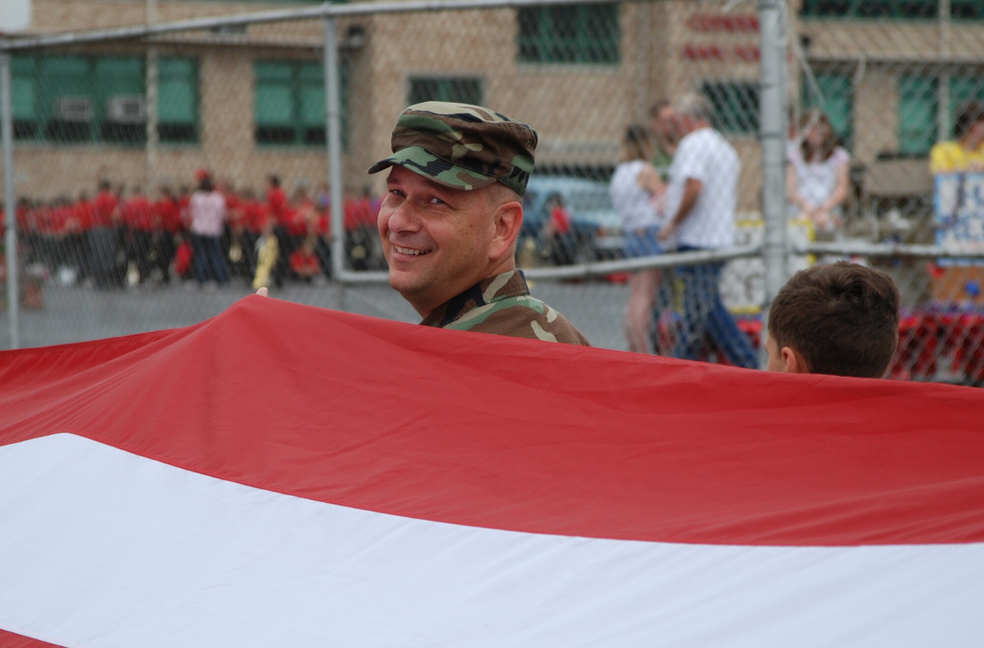 Tech Sgt. Gerald Sonnenberg enjoys the march as the 932nd Airlift Wing participated in the 2007 Memorial Day parade.