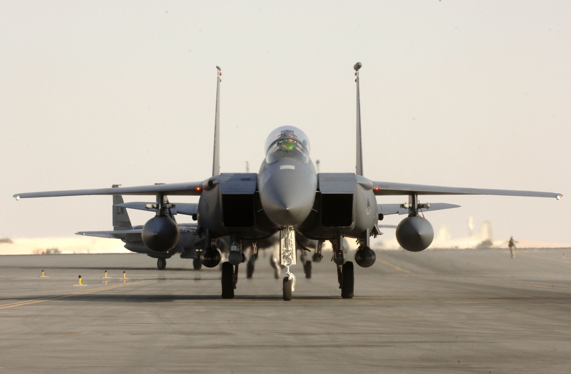 U.S. Air Force F-15E Strike Eagles taxi down the flightline at a base in Southwest Asia. F-15Es flew four out of the 43 close-air-support missions supporting Operation Enduring Freedom May 26. (U.S.Air Force courtesy photo)