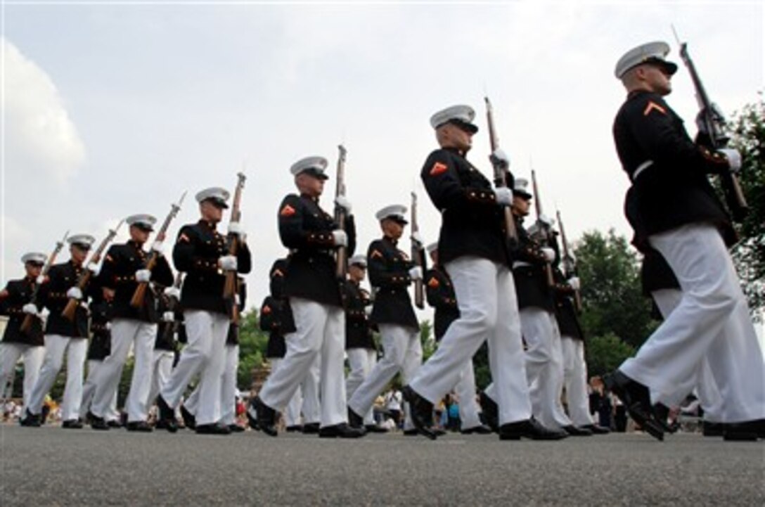 United States Marines just returning from their deployment to Iraq march in formation holding their M-14’s while participating in the Memorial Day Parade on Constitution Ave. in Washington, DC, May 28, 2007.