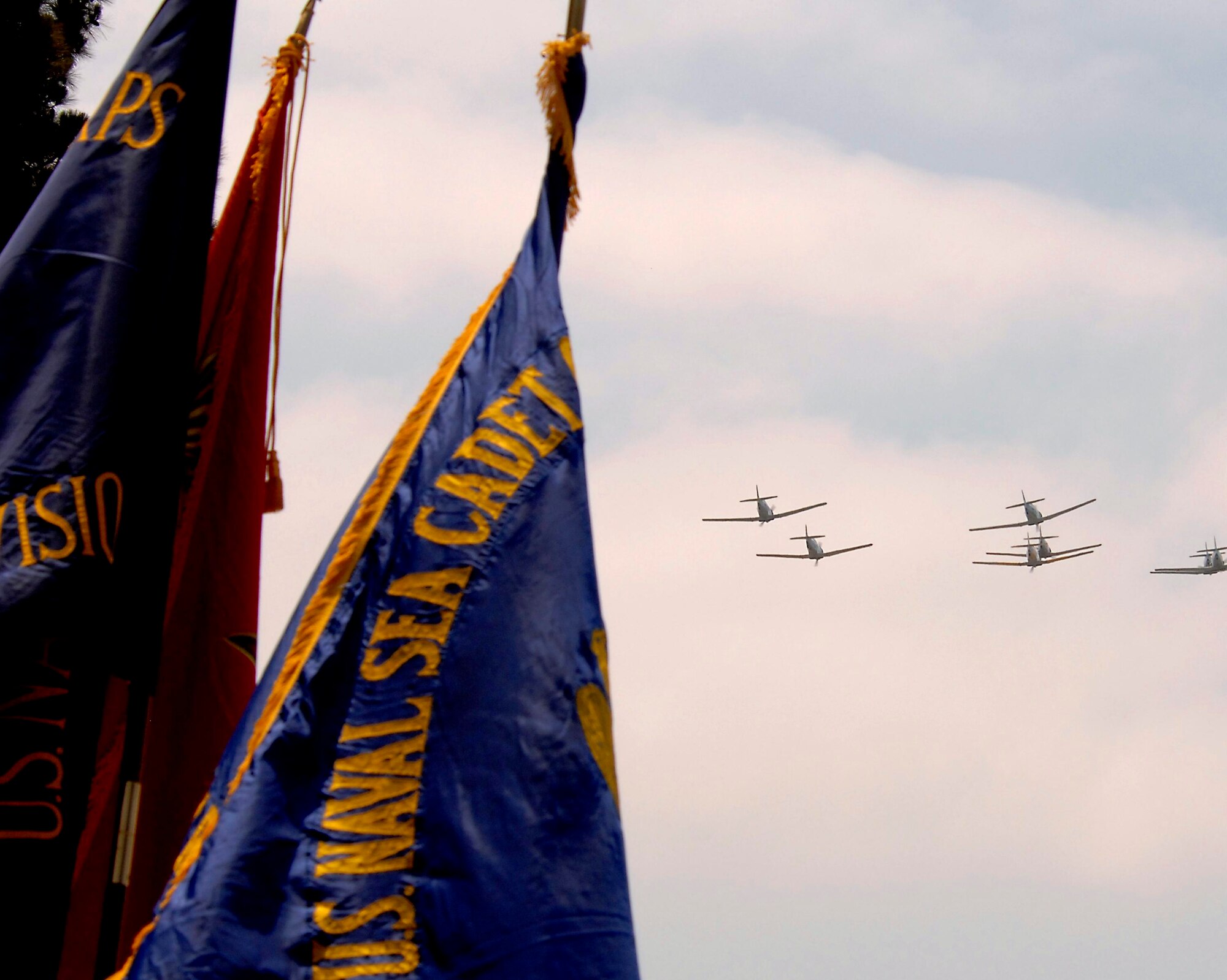 WW II-era T-6 trainer aircraft, piloted by members of the Condor Squadron, flyover the Los Angeles National Cemetery during this year’s Memorial Day salute, May 28. Lt. Gen. Michael Hamel, SMC Commander, was the keynote speaker.