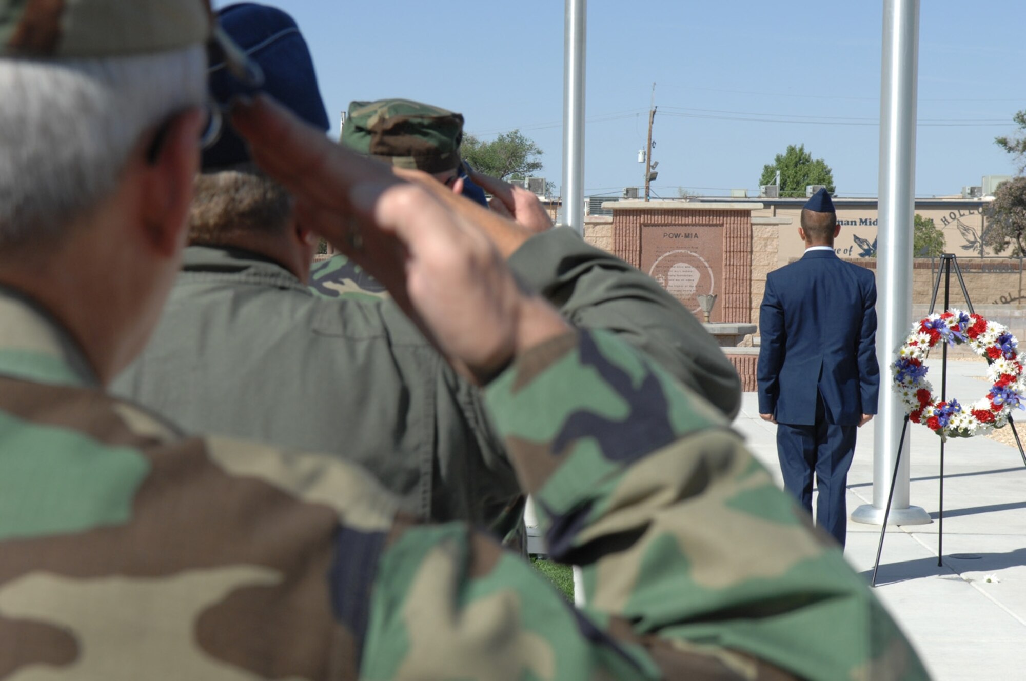 Members of Team Holloman pay tribute to fallen soldiers during the Memorial Day ceremony. (U.S. Air Force photo by Senior Airman Anthony Nelson)