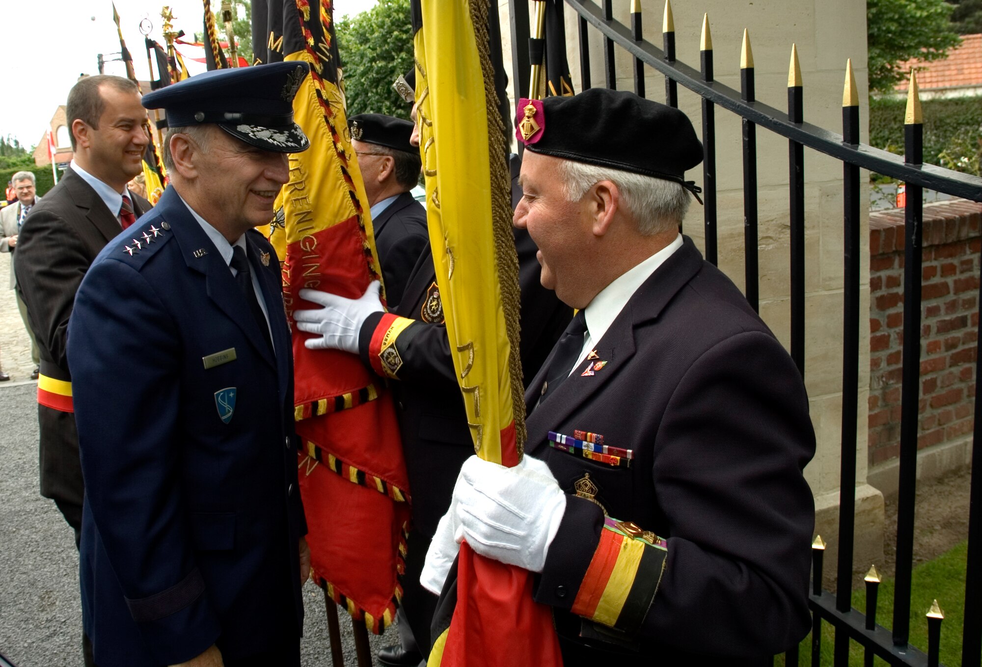 Gen. Tom Hobbins, Commander of U.S. Air Forces in Europe, greets a veteran at  Flanders Field American Cemetery in Belgium where the general paid tribute to the 368 U.S. servicemembers buried here who died in battle while liberating Belgium during World War I. (U.S. Air Force photo/Staff Sgt. Dan Bellis)