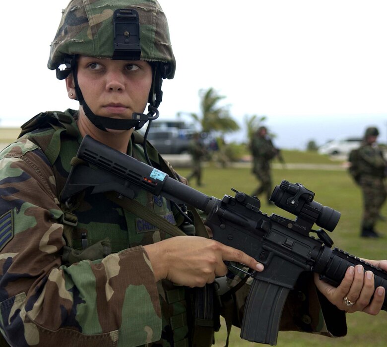 Staff Sgt. Amanda Chernogovec, 736th Security Forces Squadron, performs a sweep during an Emergency Management Exercise, May 14.  The EME was one area of evaluation during Andersen's Unit Compliance Inspection. (Photo by Senior Airman Miranda Moorer/36th Communications Squadron)
