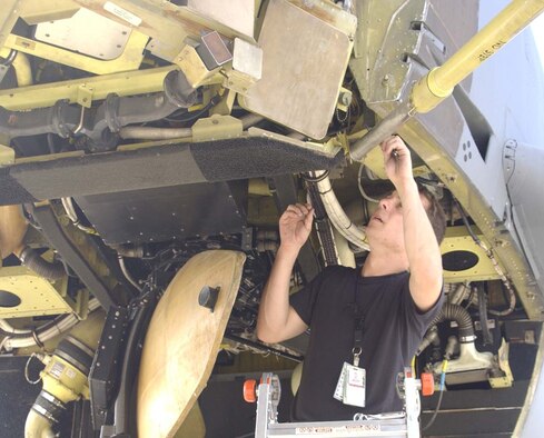 An 36th Expeditionary Aircraft Maintenance Squadron Airman maintains a B-52.  (Photo by Master Sgt. Arthur Webb/ 36th Operations Support Squadron)