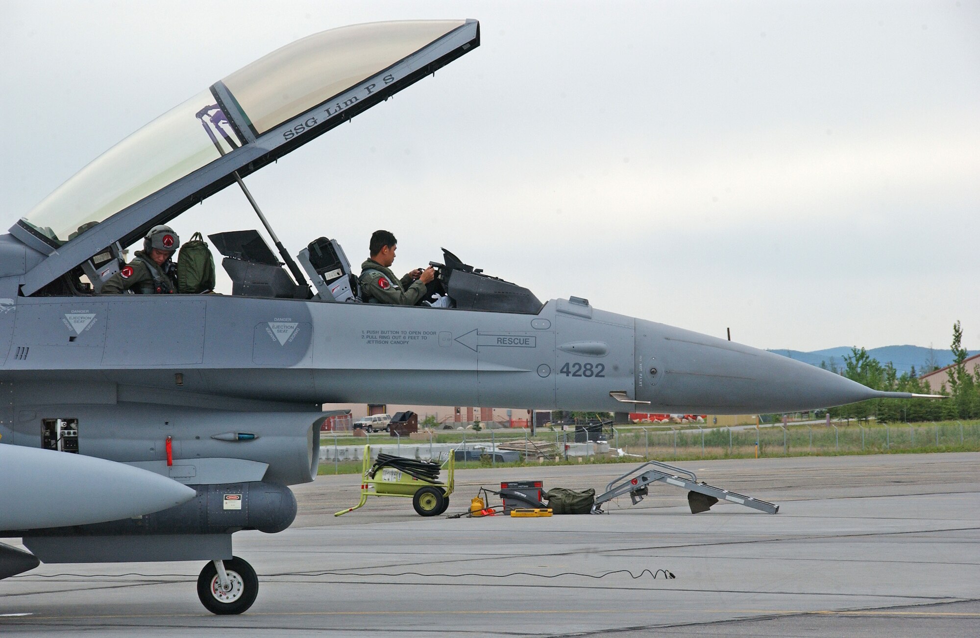 EIELSON AIR FORCE BASE, Alaska--Republic of Singapore air force pilots, from the 425th Fighter Squadron, complete post-flight checks after landing May 30 here for Red Flag-Alaska 07-2. The 425th Fighter Squadron's current mission is to provide advanced weapons and tactics continuation training for Republic of Singapore Air Force F-16 pilots and maintenance personnel. They are located at Luke Air Force Base, Ariz. (U.S. Air Force photo by Senior Airman Justin Weaver). 