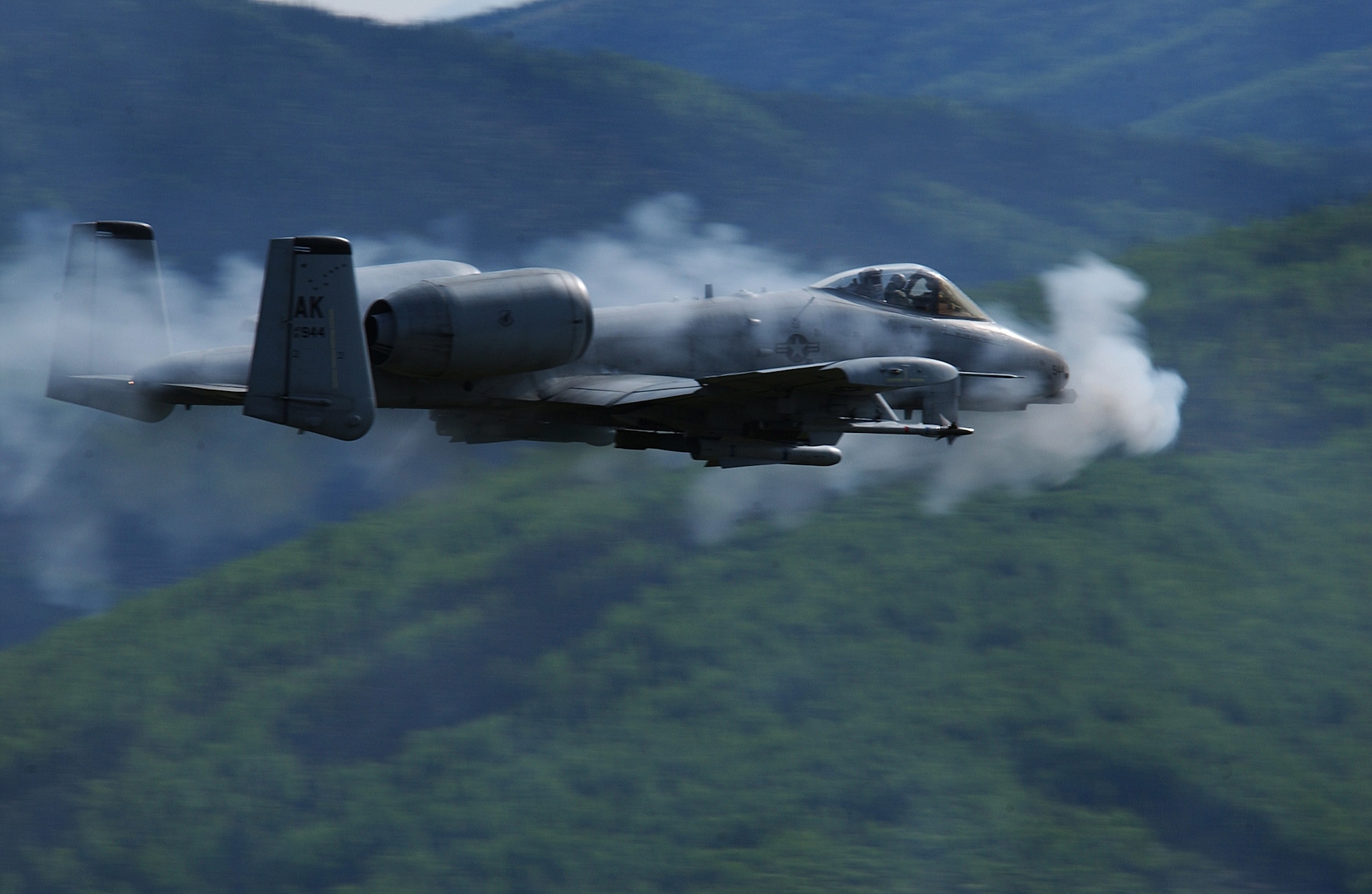 EIELSON AIR FORCE BASE, Alaska -- An A/OA-10 Thunderbolt II aircraft from the 355th Fighter Squadron fires a 30mm GAU-8 Avenger seven-barrel Gatling gun at a rate of 3,900 rounds a minute May 29 over the Pacific Alaska Range Complex. The 355th FS's primary missions include air strike control, close air support, target interdiction, joint air attack team, combat escort, and combat search and rescue. (U.S. Air Force Photo by Airman 1st Class Jonathan Snyder) 