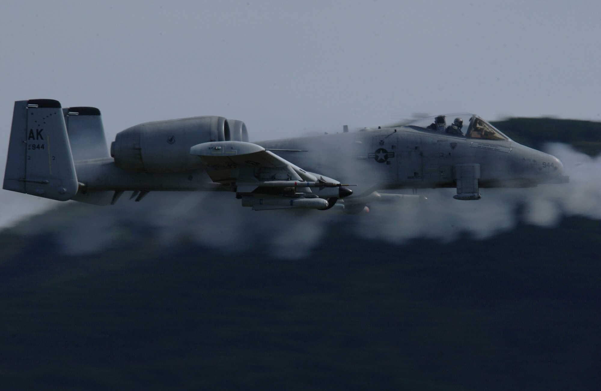 EIELSON AIR FORCE BASE, Alaska -- An A/OA-10 Thunderbolt II aircraft from the 355th Fighter Squadron fires a 30mm GAU-8 Avenger seven-barrel Gatling gun at a rate of 3,900 rounds a minute May 29 over the Pacific Alaska Range Complex. The 355th FS's primary missions include air strike control, close air support, target interdiction, joint air attack team, combat escort, and combat search and rescue. (U.S. Air Force Photo by Airman 1st Class Jonathan Snyder) 