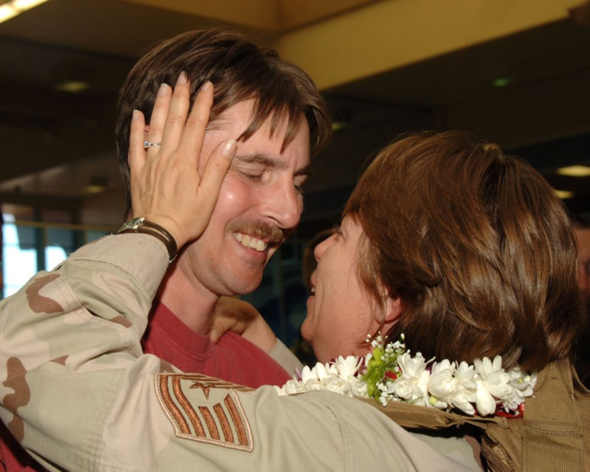 Tech. Sgt. Nancy LeVerich, 15th Communications Squadron, was met by her boyfriend of seven years, Master Sergeant Guy Geroux, and a marriage proposal.  "I've waited seven years," she said. "I'd definitely say yes."