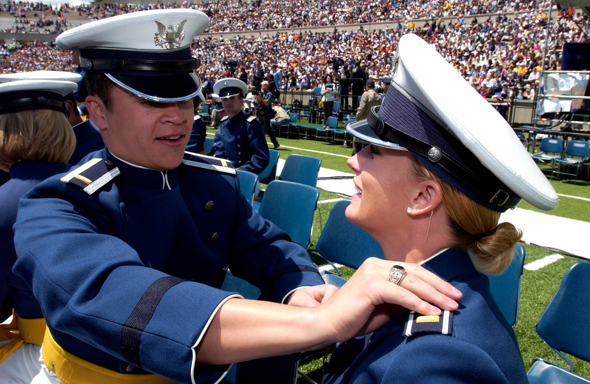 Newly minted 2nd Lt. David Drennan pins second lieutenant bars on Catlin Butterfield during the 2007 U.S. Air Force Academy graduation ceremony May 30 in Colorado Springs, Colo. (U.S. Air Force photo/Mike Kaplan)
