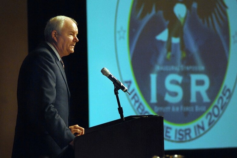 OFFUTT AIR FORCE BASE, Neb. -- The Honorable Michael W. Wynne, Secretary of the Air Force, speaks May 23 at the Innaugural 55th Wing ISR Symposium hosted at the Hilton of Omaha. (U.S. Air Force Photo/Josh Plueger)