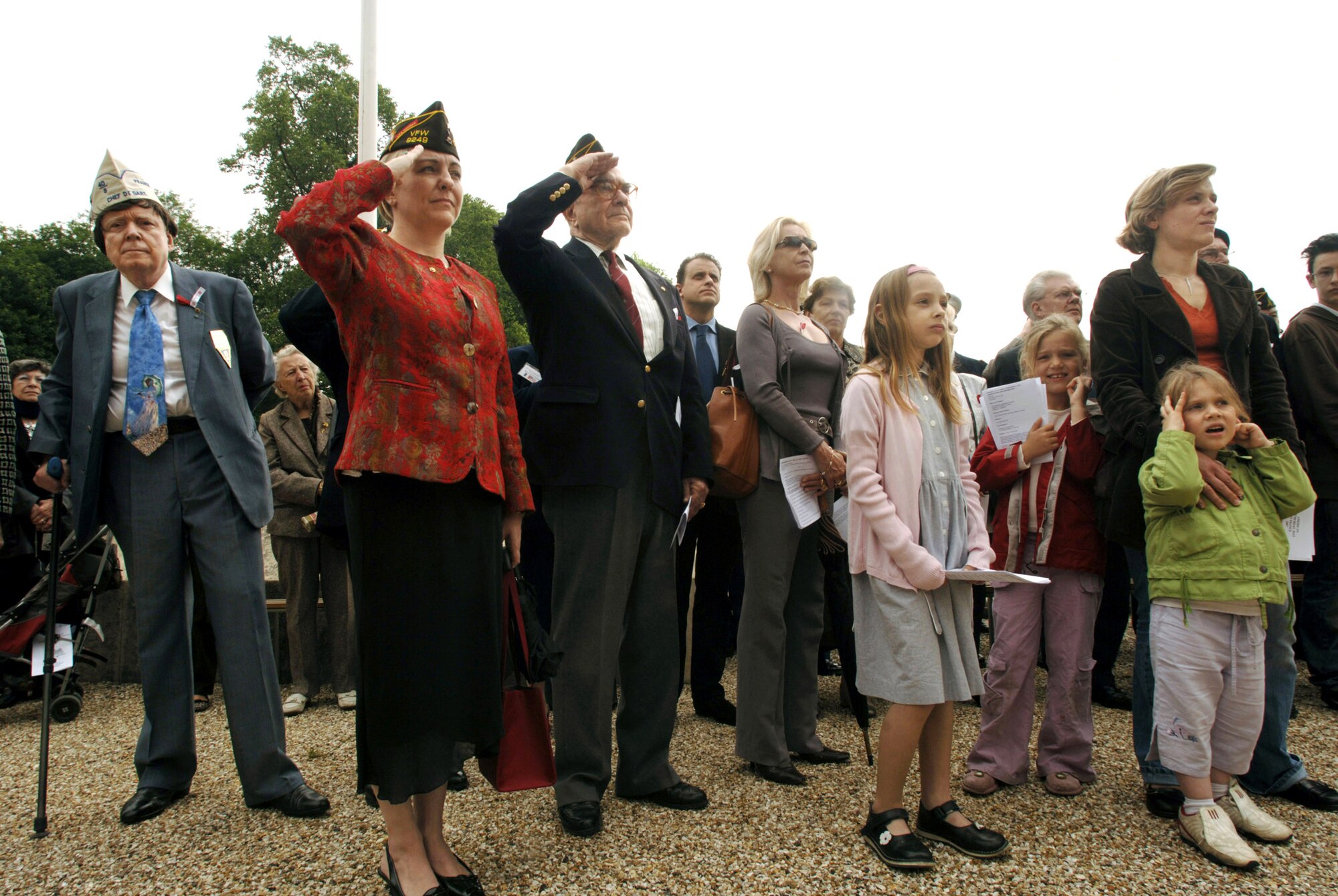 French and American citizens pay homage to the United States' first combat aviators, comprising the Lafayette Escadrille, during a ceremony at the Lafayette Memorial outside Paris.  The all-American squadron of volunteers flew under the French flag during World War I where many gave their lives.  (U.S. Air Force photo/Master Sgt. Scott Wagers)