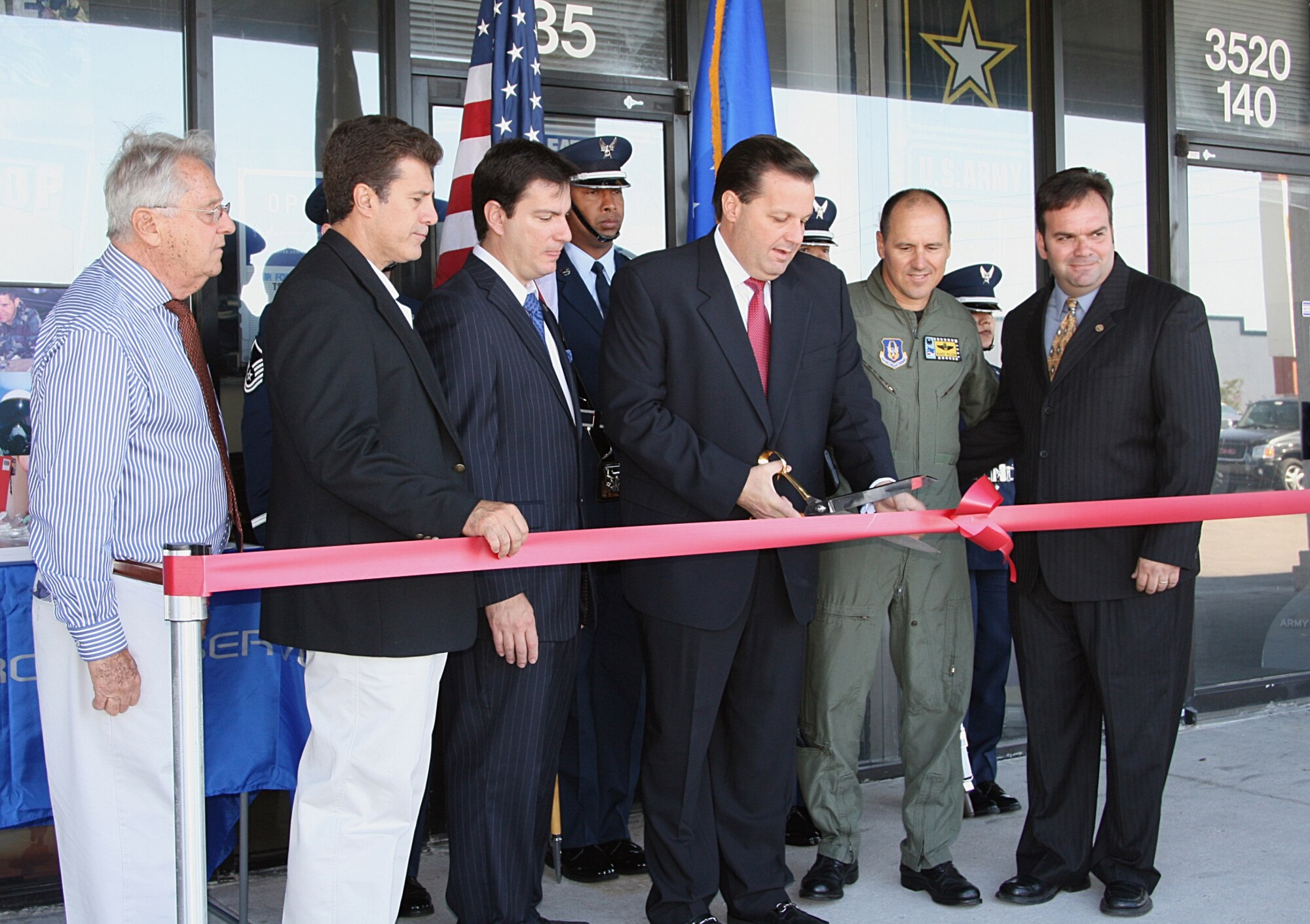 City of Hialeah Mayor Julio Robaina cuts the ribbon marking the grand opening of a new Air Force Reserve recruiting office May 8. 482nd Fighter Wing Command Col. Randy Falcon (second from right) and members of the Hialeah city council attended the ceremony to welcome the recruiters to the area. The Hialeah office is the third satellite recruiting station for the 482nd Fighter Wing in South Florida. (Courtesy photo)