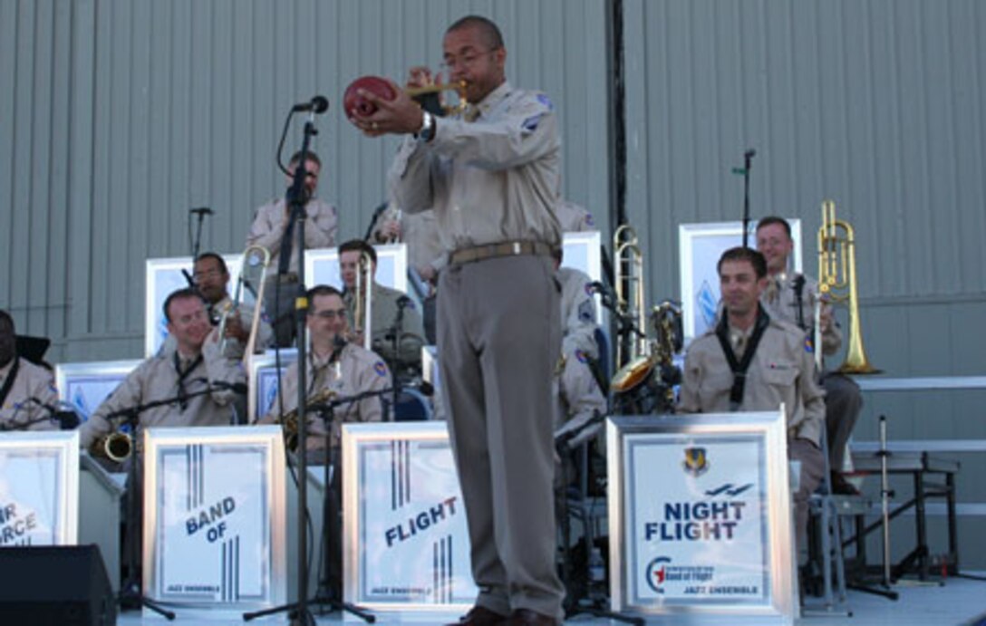 USAF Band of Flight Night Flight Jazz Band in concert at the annual Glenn Miller Tribute outside the National Museum of the USAF.  SSgt Brian Hornbuckle, trumpet, takes a solo.