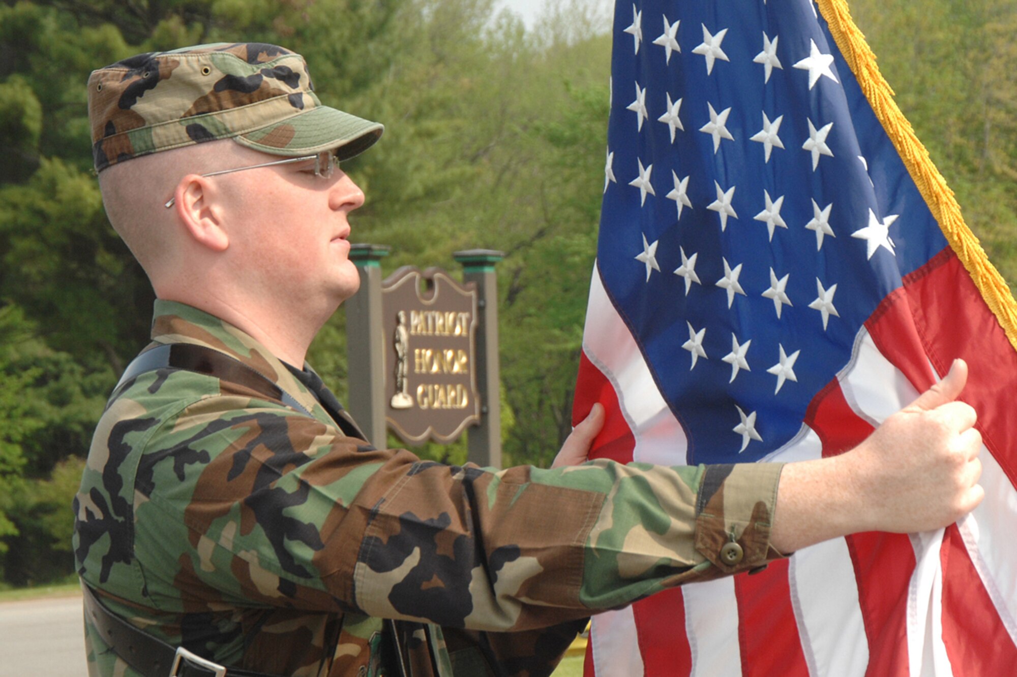 1st Lt. Phil Meikle, Electronic Systems Center, practices posting the Colors. Patriot Honor Guard members and servicemembers from around New England were invited to Hanscom to learn from and train with the Air Force’s elite Honor Guard mobile training team.  (US Air Force Photo by Linda LaBonte Britt)