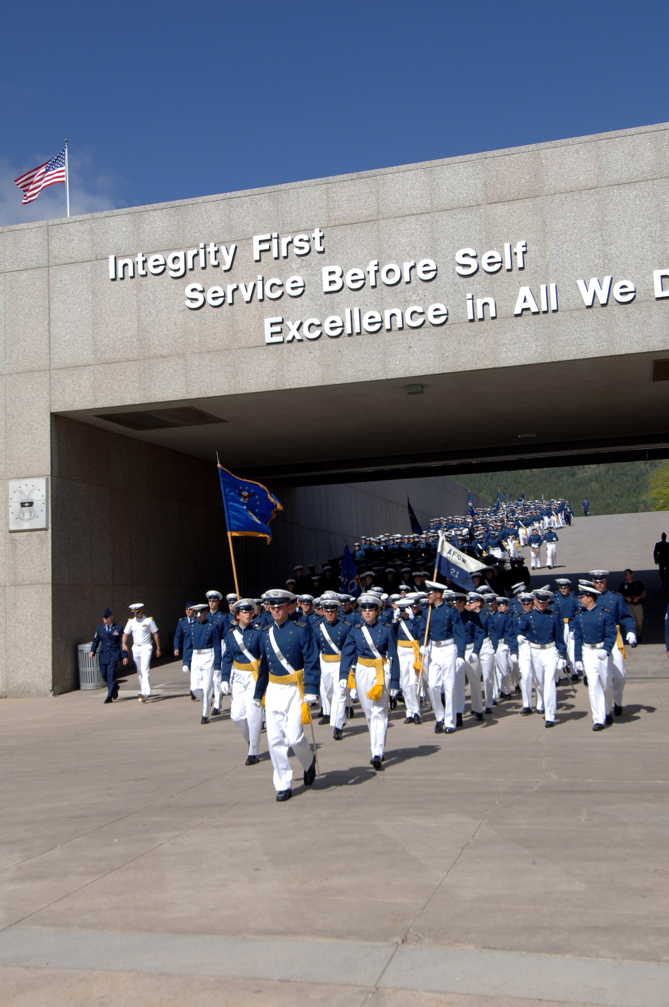 Cadets march onto the parade field during the 2007 Graduation Parade May 29 at the U.S. Air Force Academy in Colorado. The graduation for the U.S. Air Force Academy's Class of 2007 will be held at 10 a.m. May 30 at Falcon Stadium. Secretary of Defense Dr. Robert M. Gates will be the guest speaker. The United States Air Force Academy offers a four-year program of instruction and experience designed to provide cadets the knowledge and character essential for leadership, and the motivation to serve as Air Force career officers. (U.S. Air Force photo/Mike Kaplan) 
