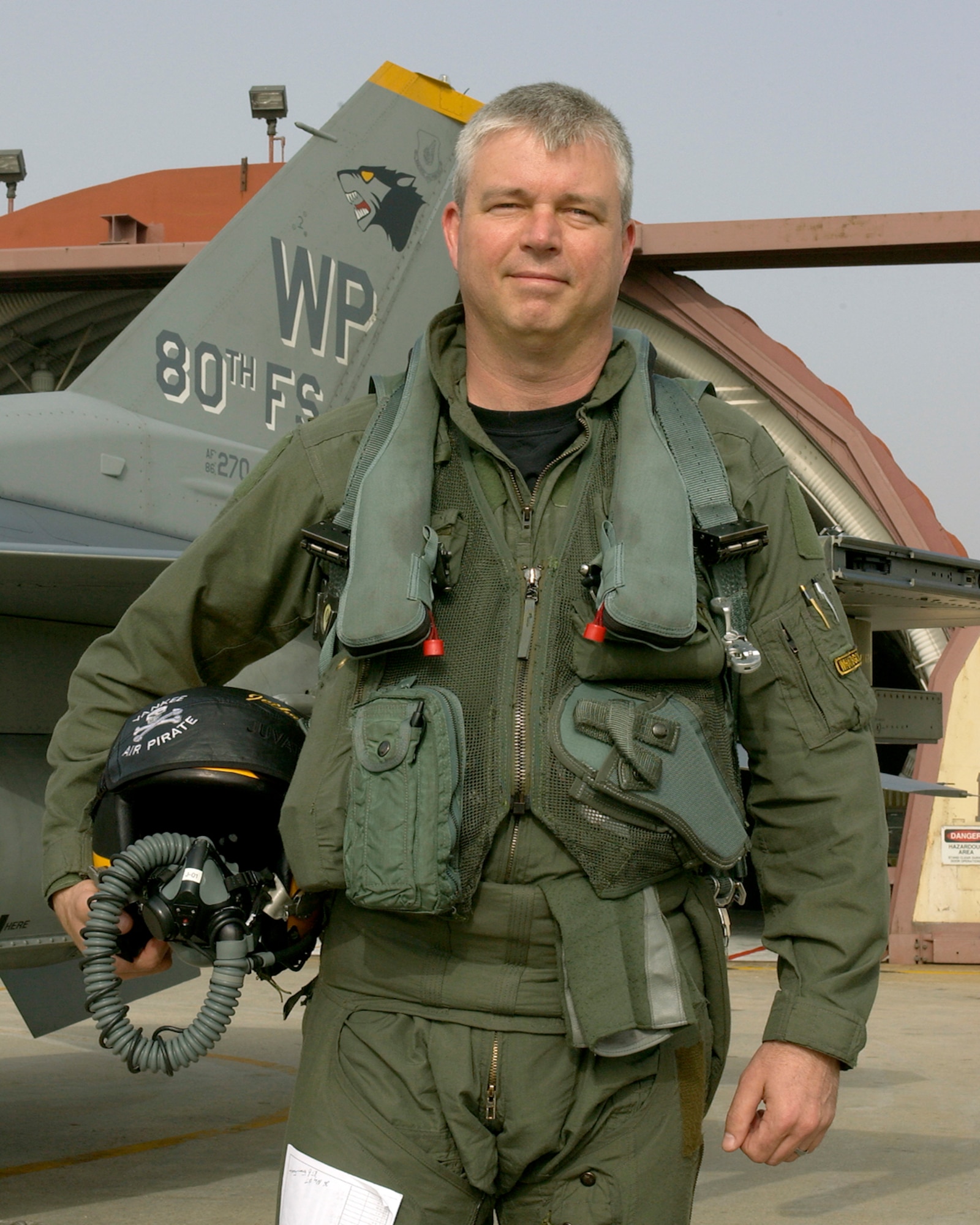 Lieutenant Col. Al Wimmer, commander of the 80th Fighter Squadron, was one of ten pilots that flew as opposing forces against Marine Corps pilots stationed at Marine Corps Air Station Iwakuni, Japan during a week long deployment. Colonel Wimmer, the other pilots and the F-16s returned to Kunsan May 25 with maintenance and support Airmen returning May 26.  (U.S. Air Force Photo by Staff Sergeant Darcie Ibidapo.)