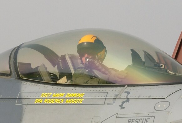 A pilot from the 80th Fighter Squadron F-16 returns to Kunsan Air Base after a week long deployment to Marine Corps Air Station Iwakuni, Japan on May 25. Pilots from the 80th FS flew dissimilar aircraft sorties as opposing forces, commonly known as red air, for Marine Corps aviators flying the F/A-18 Hornet. The sorties are valuable upgrade and continous training for pilots within the two units.  (U.S. Air Force Photo by Staff Sergeant Darcie Ibidapo.)