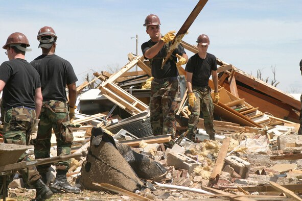 The Kansas Air National Guard works to remove debris from Greensburg High School. (Photo by Army Sgt. Heather Wright)