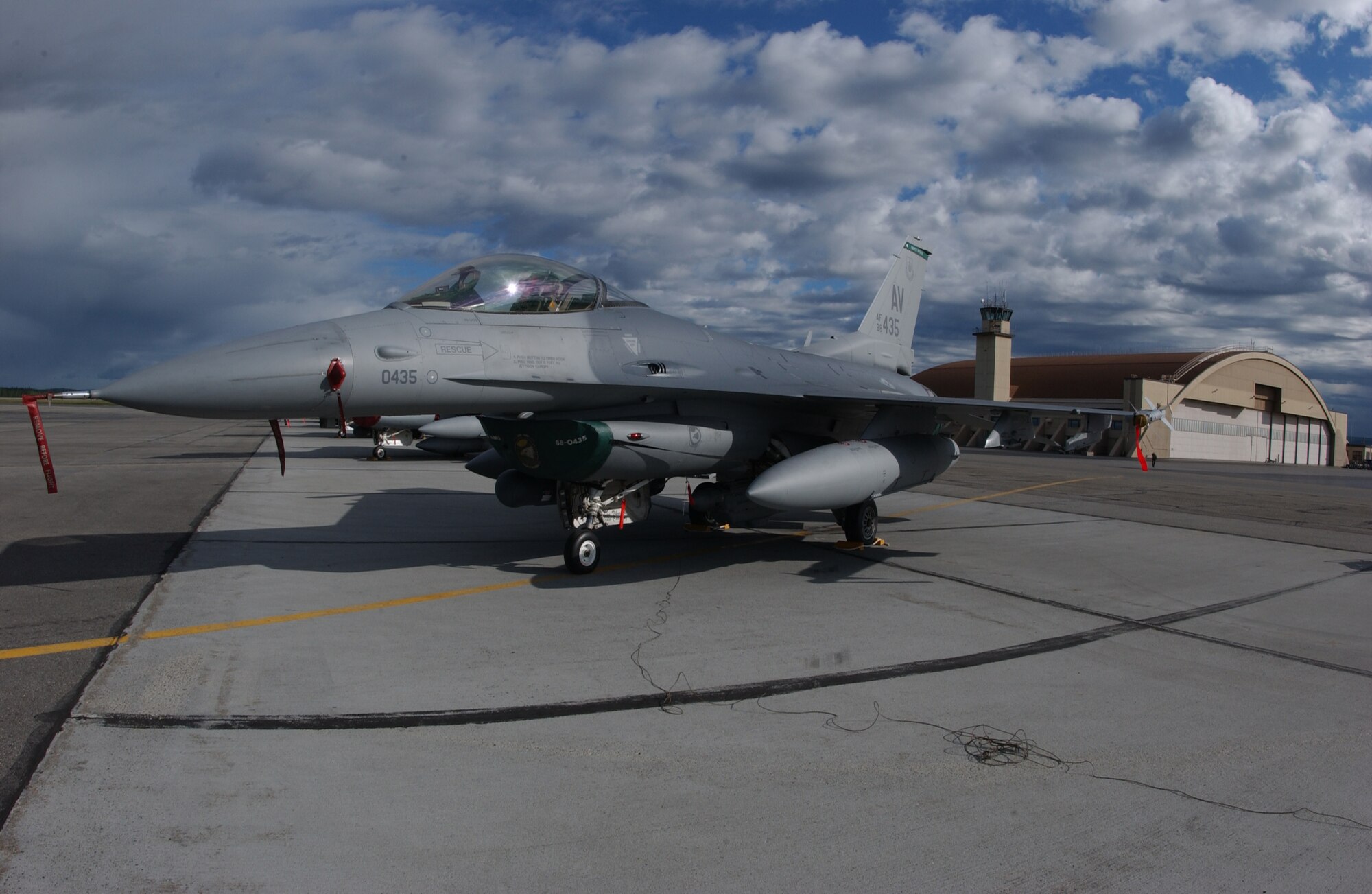 EIELSON AIR FORCE BASE, Alaska -- An F-16 Fighting Falcon, 555th Fighter Squadron, Aviano Air Base, Italy, sits in front of the Thunderdome on May 31 for Red Flag-Alaska 07-2. RF-A is a Pacific Air Forces-directed field training exercise for U.S. and coalition forces flown under simulated air-combat conditions. It is conducted on the Pacific Alaska Range Complex with air operations flown out of Eielson and Elmendorf Air Force Bases.  (U.S. Air Force Photo by Airman 1st Class Jonathan Snyder) 