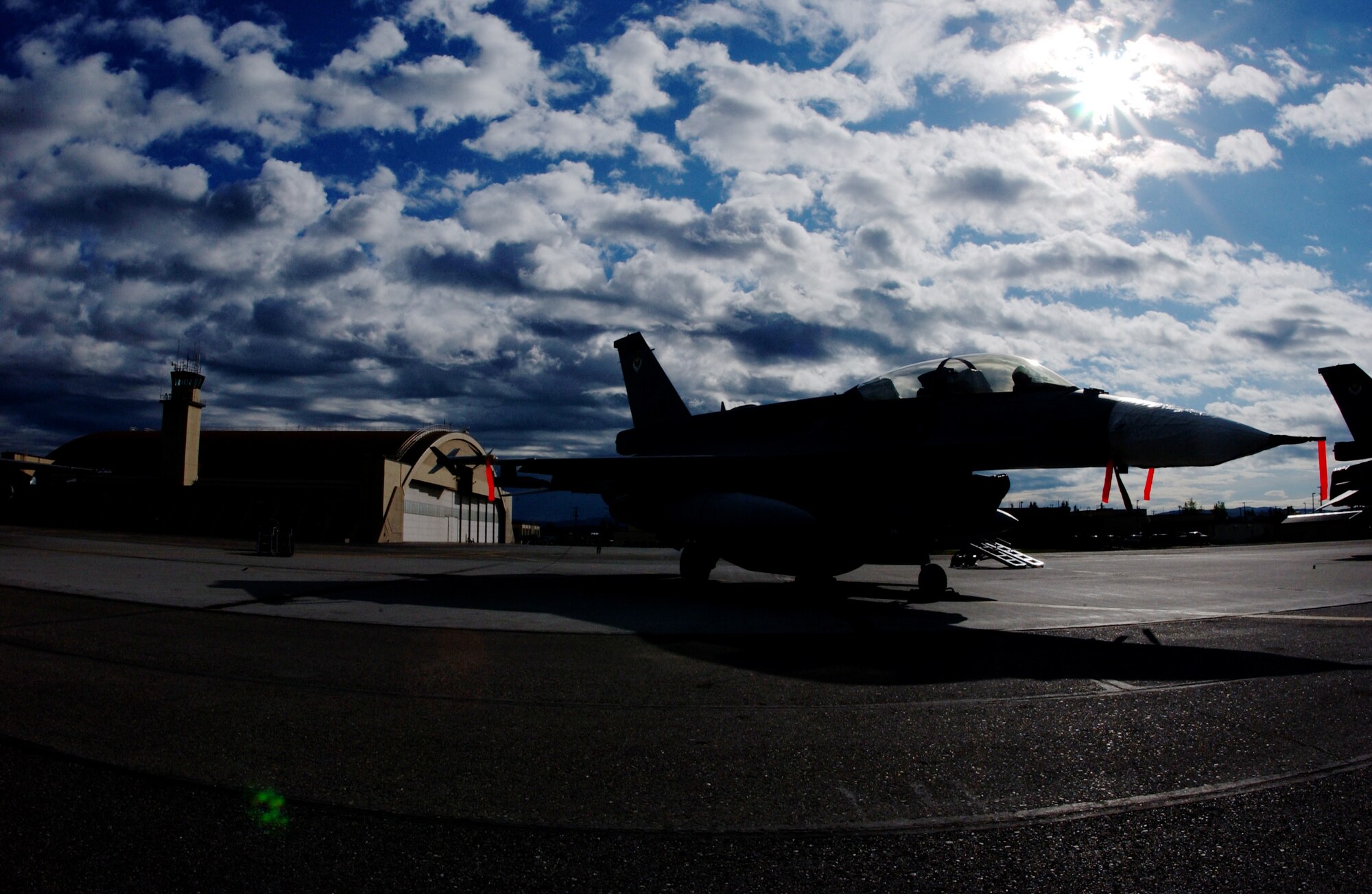 EIELSON AIR FORCE BASE, Alaska -- A Republic of Singapore Air Force F-16 Fighting Falcon sits in front of the Thunderdome May 31 for Red Flag-Alaska 07-2. 
RF-A is a Pacific Air Forces-directed field training exercise for U.S. and coalition forces flown under simulated air-combat conditions. It is conducted on the Pacific Alaska Range Complex with air operations flown out of Eielson and Elmendorf Air Force Bases.  (U.S. Air Force Photo by Airman 1st Class Jonathan Snyder) 