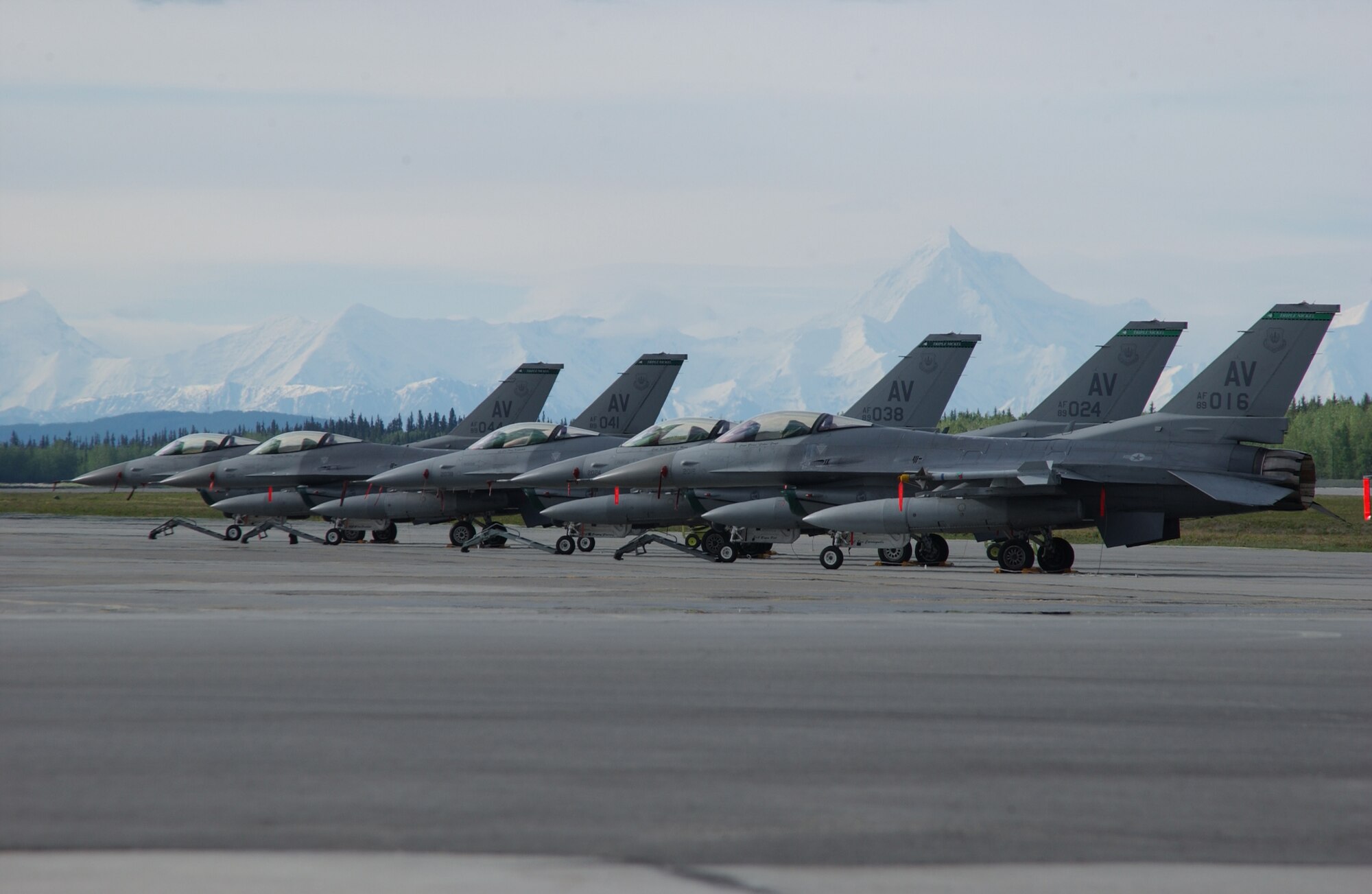 EIELSON AIR FORCE BASE, Alaska -- Five F-16 Fighting Falcons, 555th Fighter Squadron, Aviano Air Base, Italy, sit on the tarmac May 31 for Red Flag-Alaska 07-2. RF-A is a Pacific Air Forces-directed field training exercise for U.S. and coalition forces flown under simulated air-combat conditions. It is conducted on the Pacific Alaska Range Complex with air operations flown out of Eielson and Elmendorf Air Force Bases.  (U.S. Air Force Photo by Airman 1st Class Jonathan Snyder) 