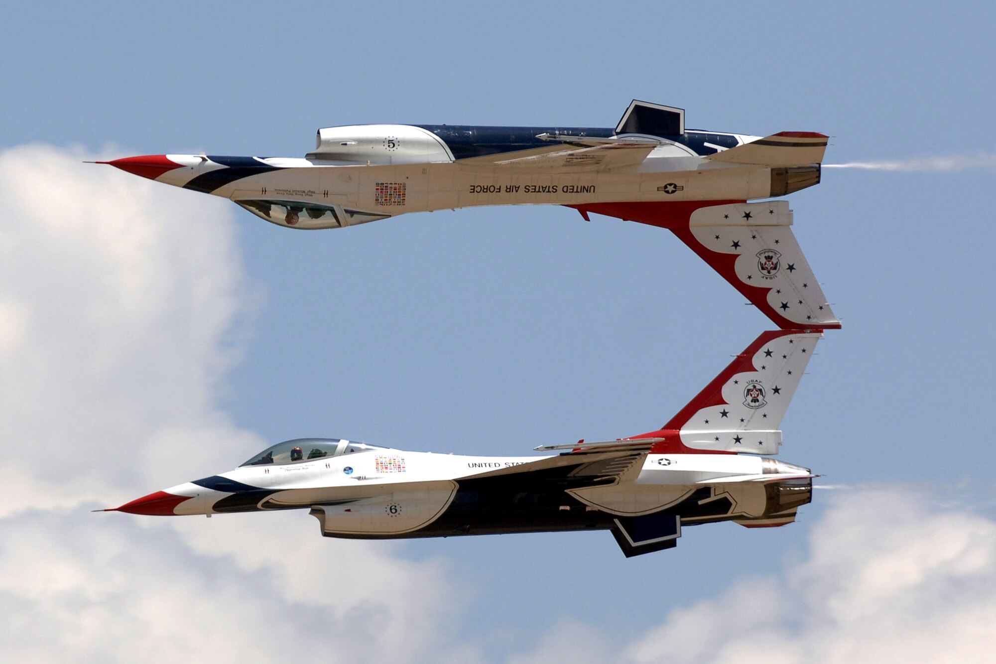 The U.S. Air Force Thunderbirds perform an airshow after the 2007 U.S. Air Force Academy Graduation Ceremony May 30 in Colorado. The ceremony marks the culmination of four years at the academy and their transition from cadet to the Air Force's newest second lieutenants. (U.S. Air Force photo/David Armer) 