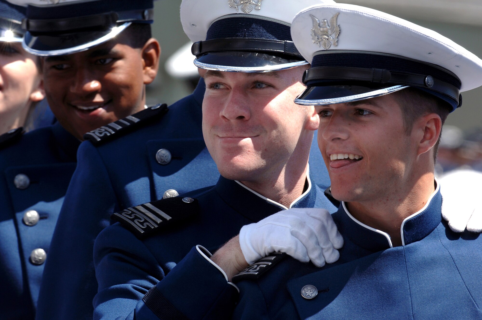 First class cadets from the U.S. Air Force Academy line up at the beginning of their commencement exercise to receive their degrees and assume the duties of the Air Force's newest second lieutenants May 30 in Colorado. The academy graduated 977 members of the class of 2007. (U.S. Air Force photo/Joel Strayer) 

