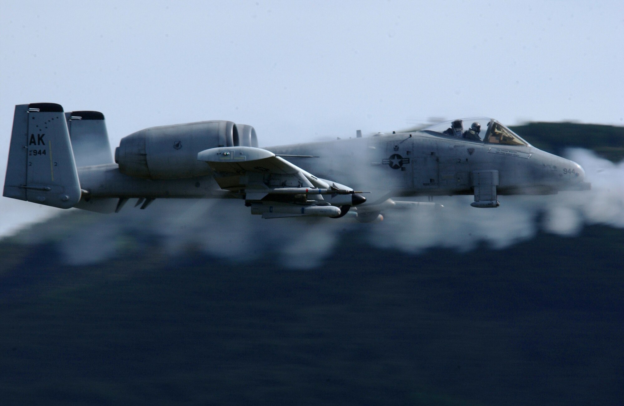 An A-10 Thunderbolt II pilot fires the aircraft's 30mm Gatling gun May 29 during an exercise over the Pacific Alaska Range Complex in Alaska.  The seven-barrel weapon can fire 3,900 rounds a minute.  The fighter is assigned to the 355th Fighter Squadron from Eielson Air Force Base, Alaska.  (U.S. Air Force photo/Airman 1st Class Jonathan Snyder)