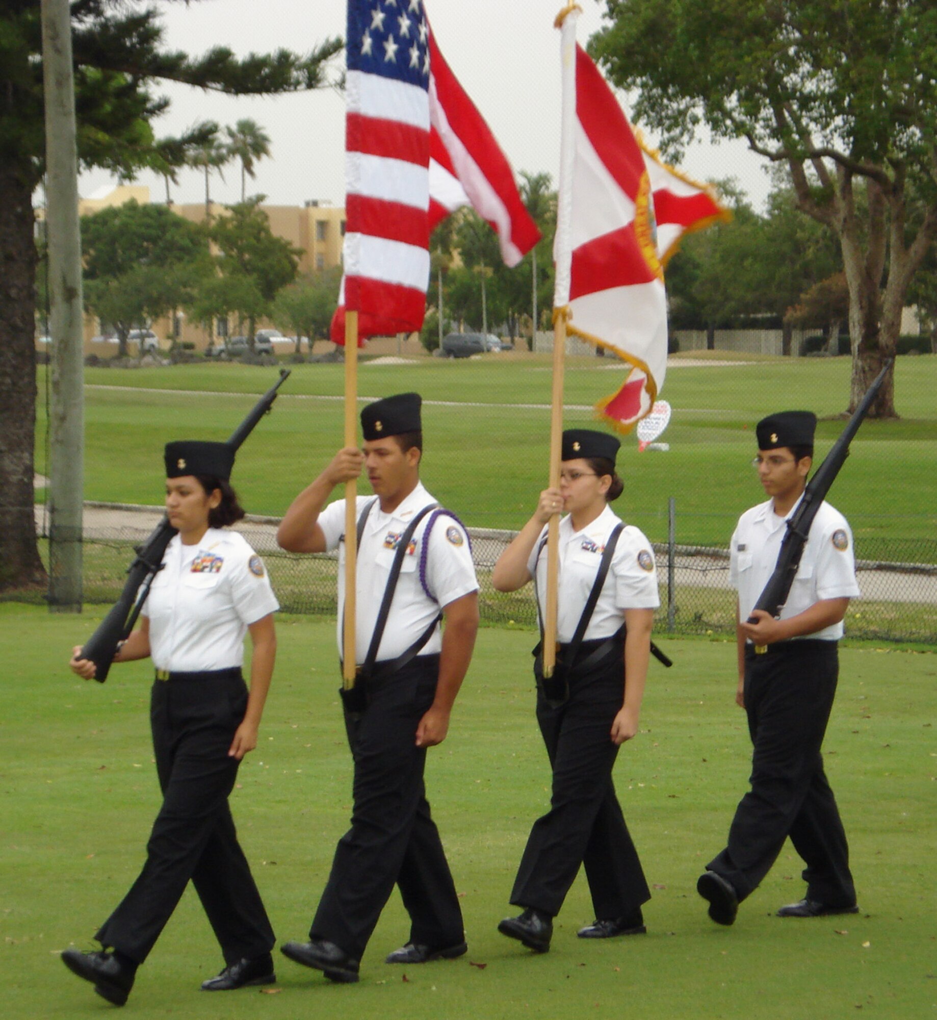A color guard of Navy Junior Officer Training Corps cadets from Felix Varela High School presents the colors to begin the 16th annual Chamber South Military Affairs Committee golf tournament at the Miccosukee Golf and Country Club May 25.  57 military golfers from the local area played for free in the tournament thanks to local civic and business leaders who sponsored them.  The tournament raised approximately $20,000 for the Chamber South chamber of commerce and culminated a month filled with military appreciation and awareness events.  (U.S. Air Force photo/Jake Shaw)