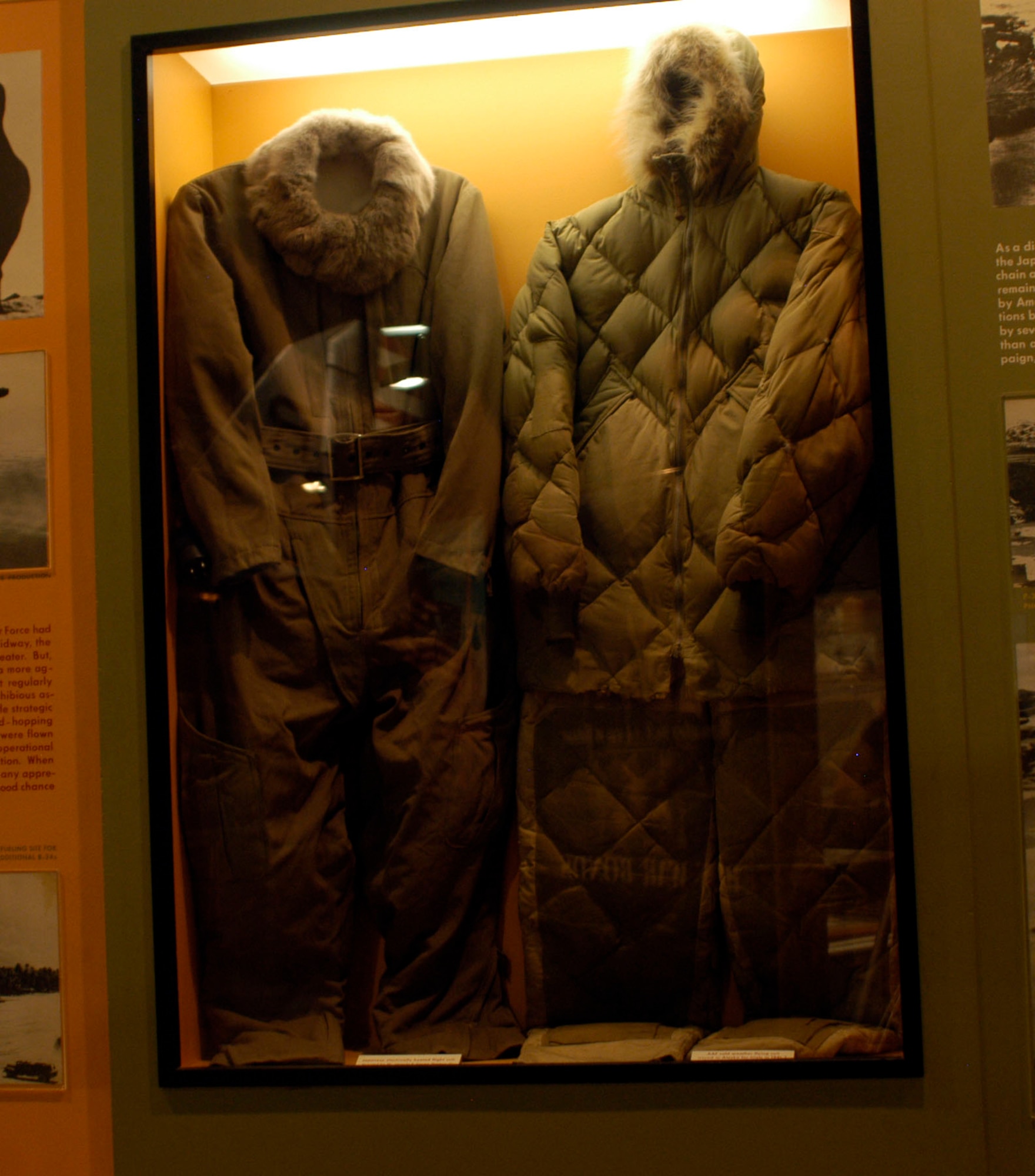 DAYTON, Ohio -- On the left is a Japanese electrically heated flight suit, and on the right is an AAF cold weather flying suit issued in Alaska for trials in 1941-1942. The Japanese flight suit was donated by Jacques E. Young from Dayton, Ohio. The AAF suit was donated by Col. (Ret.) F.B. Gallagher from Pinellas, Fla. Both are on display in the World War II Gallery at the National Museum of the U.S. Air Force. (U.S. Air Force photo)