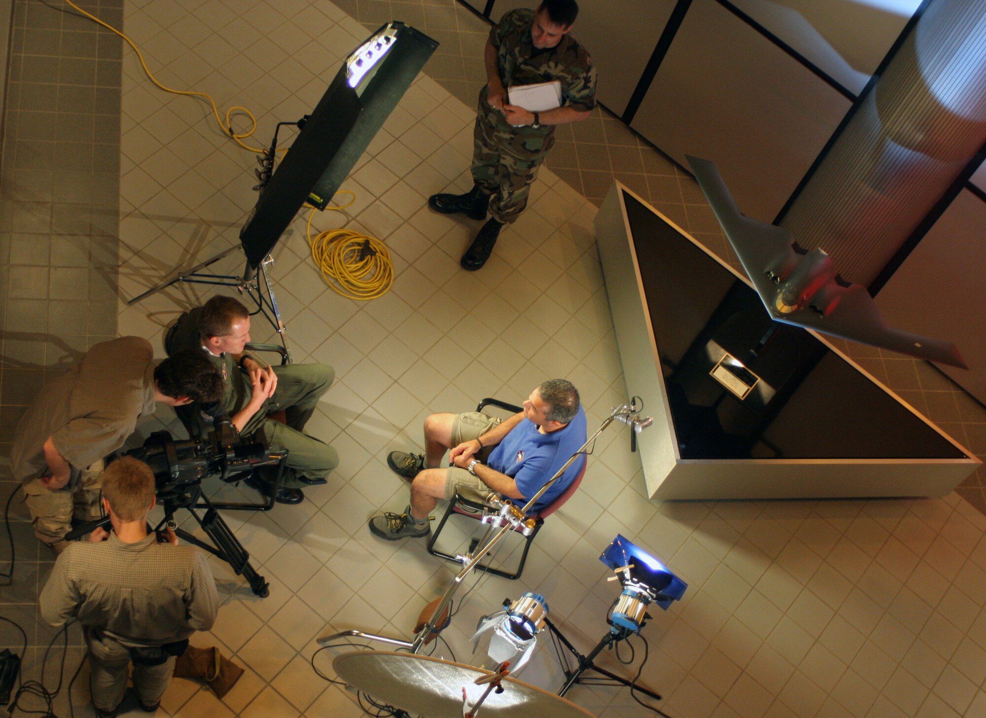 A Smithsonian Institute film crew interviews Lt. Col. Troy VanBemmelen, 394th Combat Training Squadron commander, May 24 for a feature documentary on stealth technology. The documentary is scheduled to air this fall. (U.S. Air Force photo by Tech. Sgt. Matt Summers)