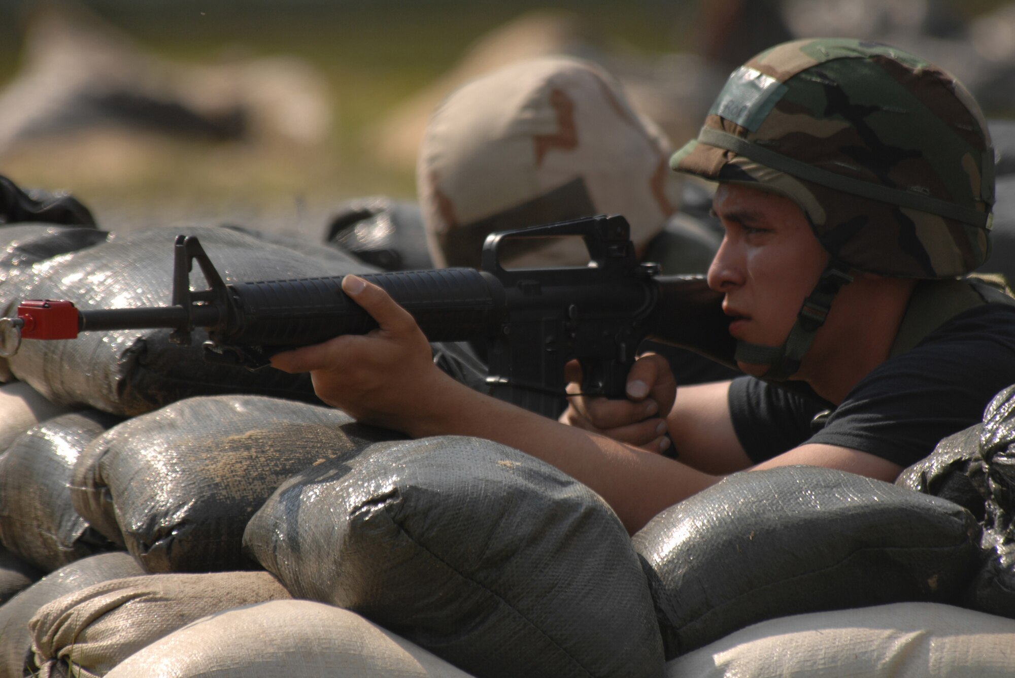 SEYMOUR JOHNSON AIR FORCE BASE, N.C. - Airman 1st Class Jonathan Roda, 4th Component Maintenance Squadron, provides security during an expeditionary combat skills training class here May 16.  The training helps the Airmen train for possible terrorist attacks while deployed to various locations. (U.S. Air Force photo by Senior Airman Chad Trujillo)
