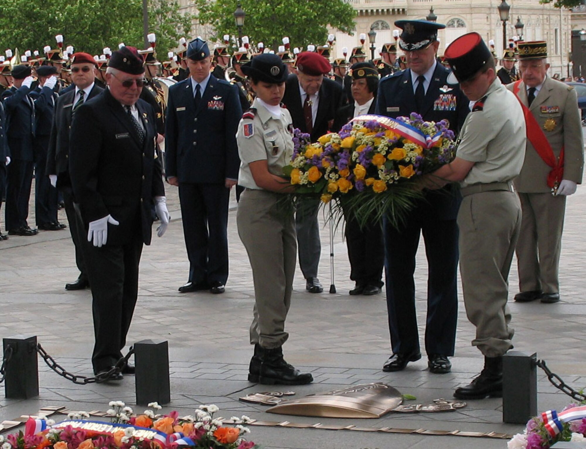 Maj Gen Marc Rogers, U.S. Air Forces in Europe vice commander, and two French soldiers lay a wreath at the Arc de Triumph Memorial Day ceremony in Paris Sunday. The general joined twenty members of the USAFE Elite Guard Honor Guard as well as members of the Paris chapters of the American Legion and many French and American veterans at the remembrance ceremony. (Photo by Capt. Chris Watt)