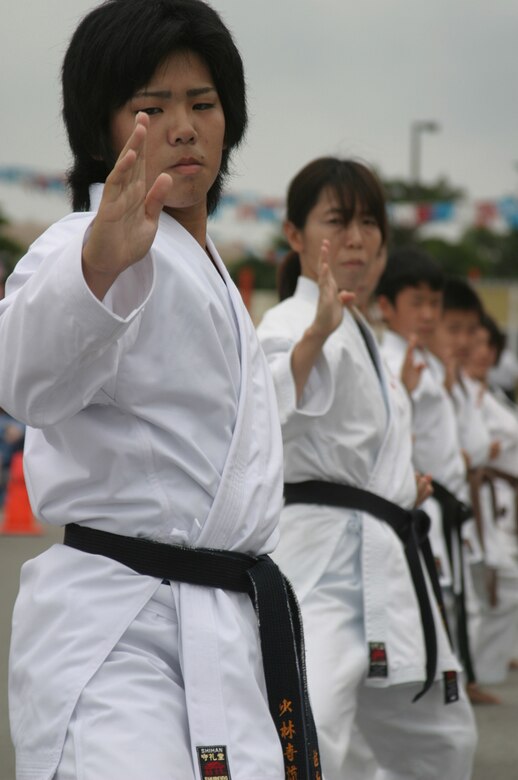 Students from Renshinkan Karate Dojo perform a martial arts demonstration during the Asian Pacific Heritage Month celebration May 26 at the Kadena Air Base, Japan, exchange parking lot. Seven groups performed cultural dances and martial arts demonstrations including: the Philippine Cultural Dancers group, Venoltian Relic, Magahet Pacific Dance group, a live Hawaiian band and the Ron Nix Hamaya Daiko group.
(U.S. Air Force/Senior Airman Nestor Cruz)