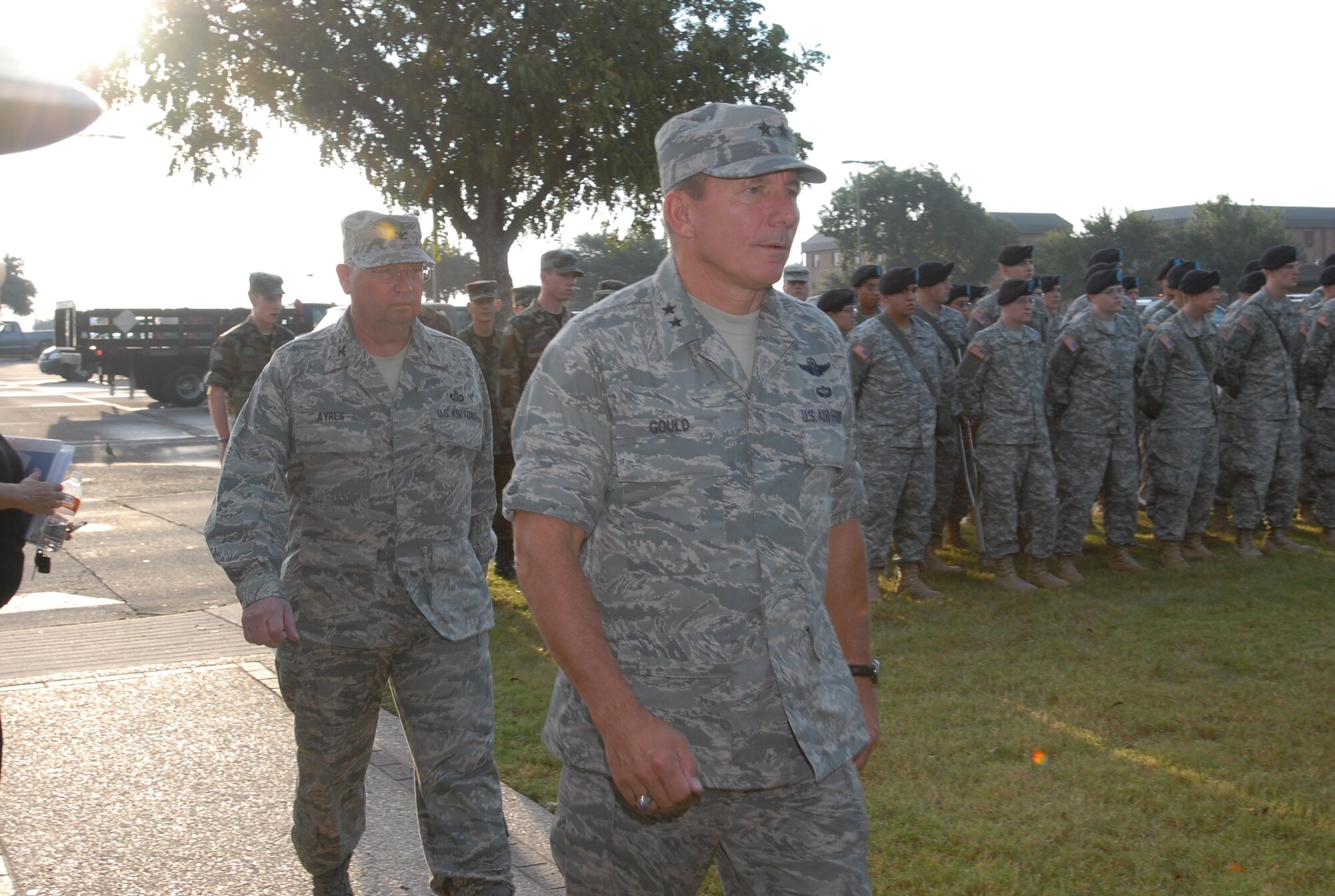 Maj. Gen. Michael Gould (center), 2nd Air Force commander, makes his way toward the Goodfellow Air Force Base’s POW/MIA memorial site Sept. 28 while Col. Richard Ayres, 17th Training Wing commander, follows. The commanders, along with dozens of civilian and military members, visited the memorial as part of the Vigil, which concluded with a solemn presentation at the Air Force Ball. Sept. 29. (U.S. Air Force photo by Staff Sgt. Angela Malek) 